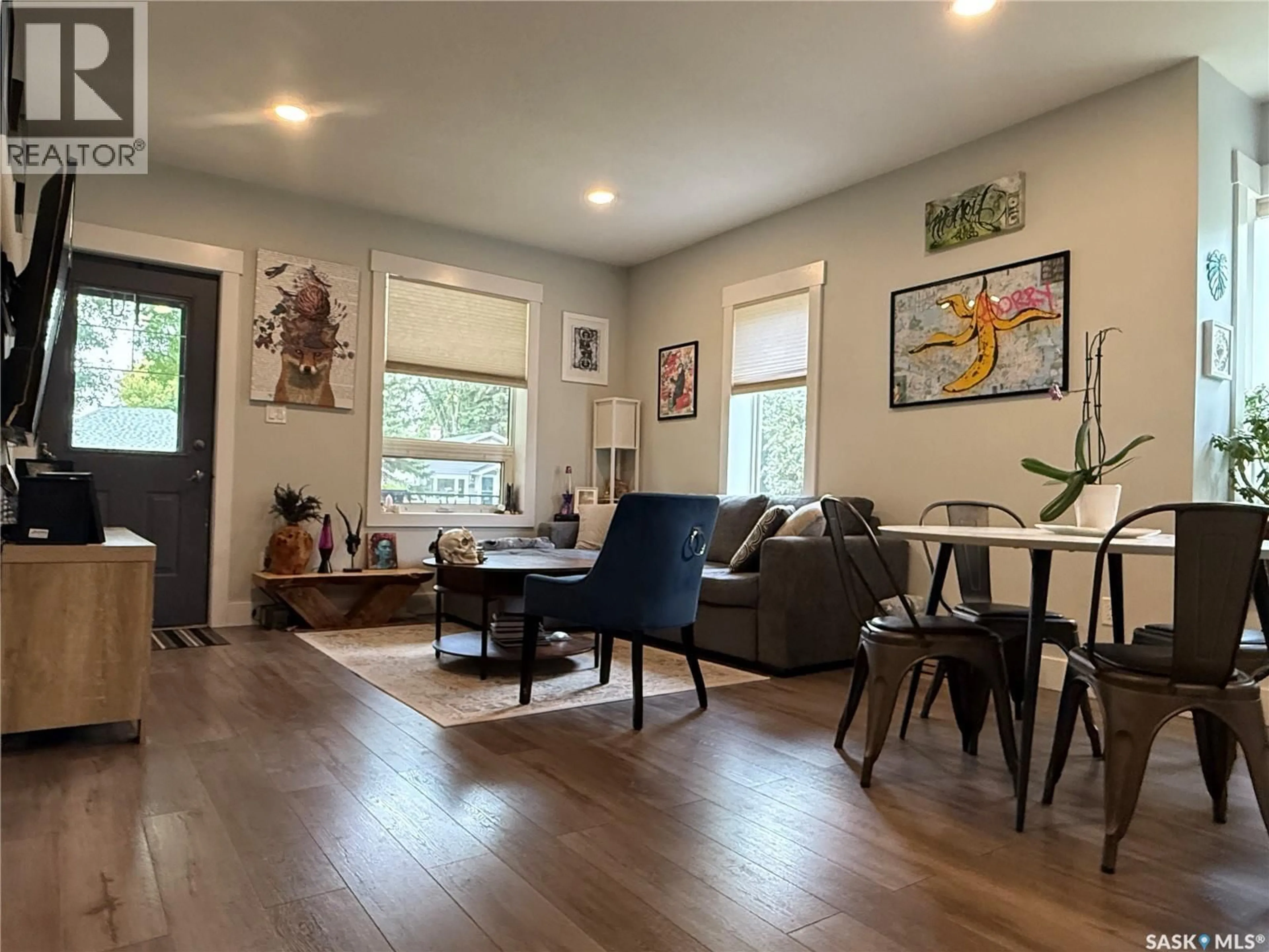 Living room with furniture, wood/laminate floor for 322 5TH AVENUE, Melville Saskatchewan S0A2P0