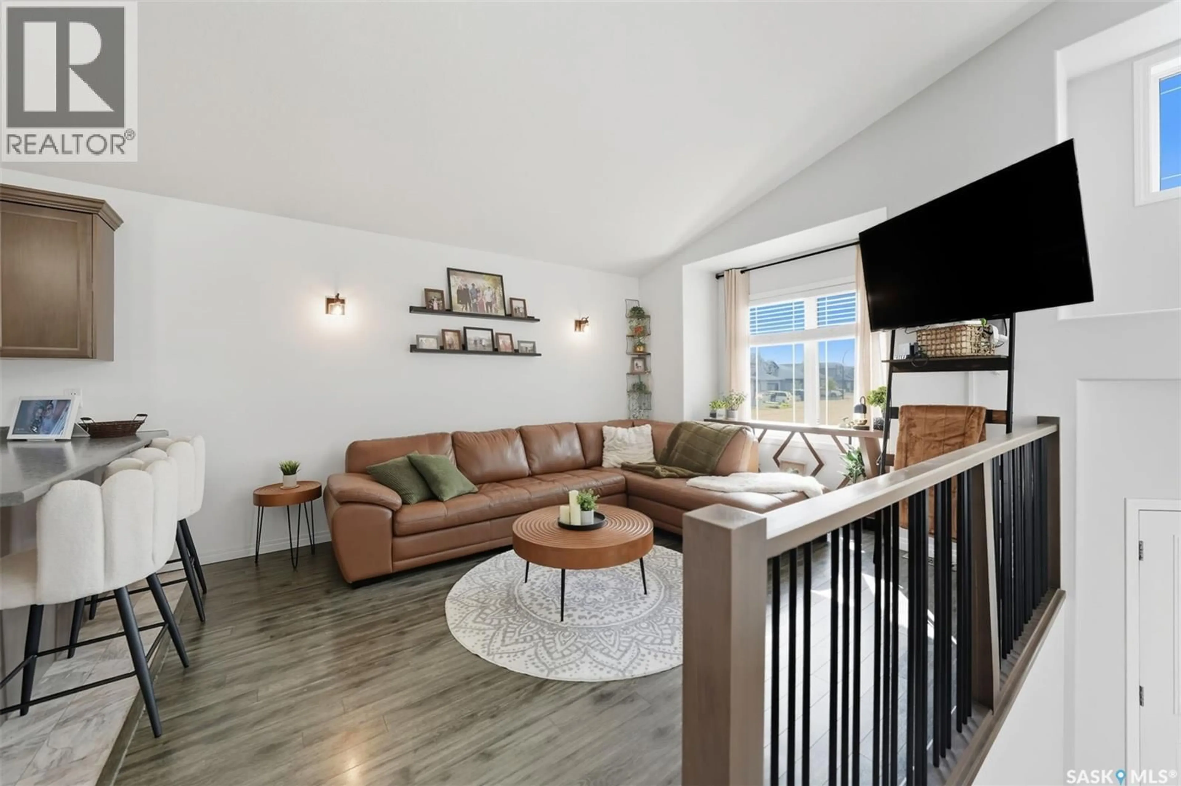 Living room with furniture, unknown for 1102 HARGREAVES WAY, Saskatoon Saskatchewan S7R0H2