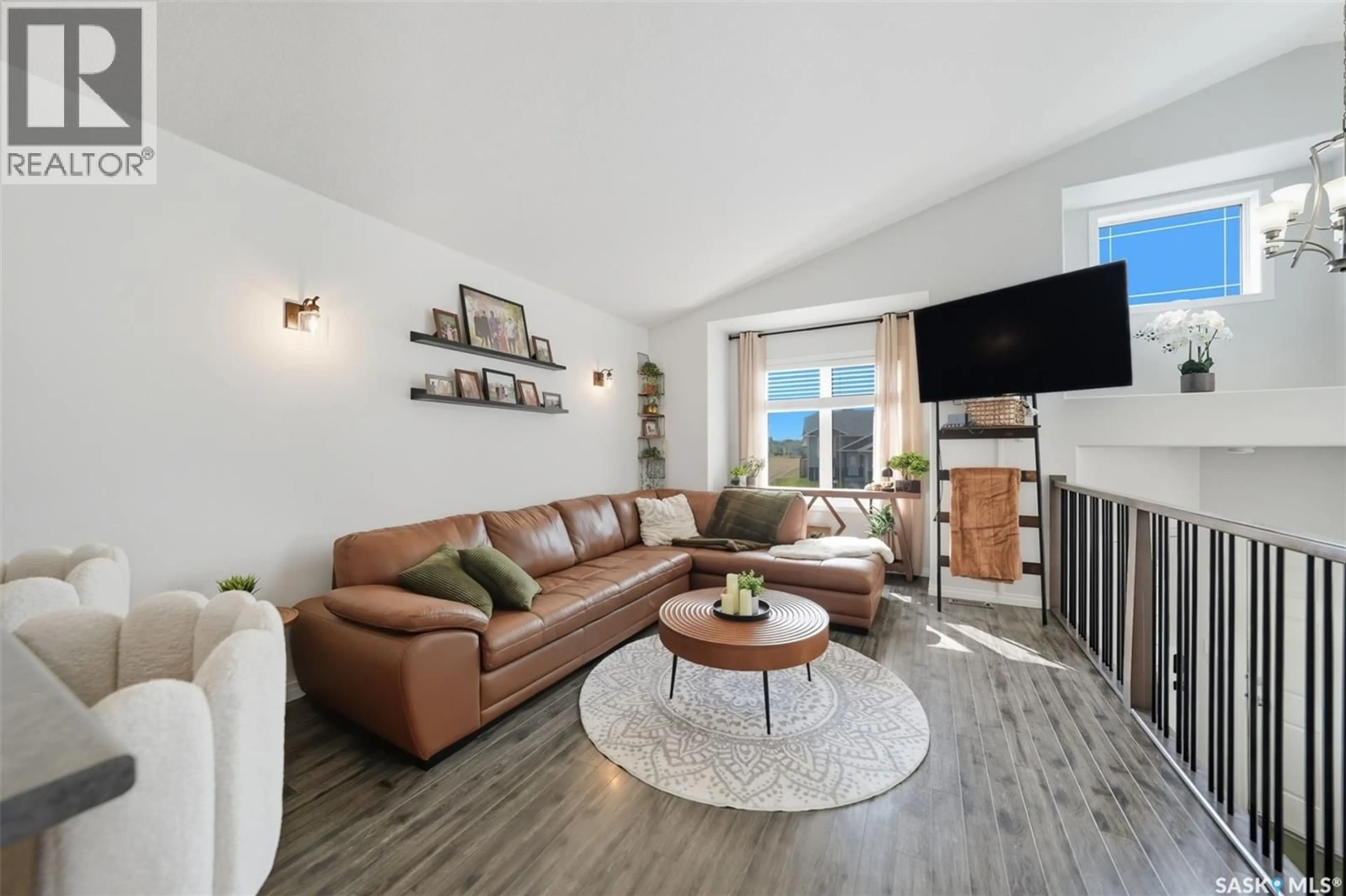 Living room with furniture, unknown for 1102 HARGREAVES WAY, Saskatoon Saskatchewan S7R0H2