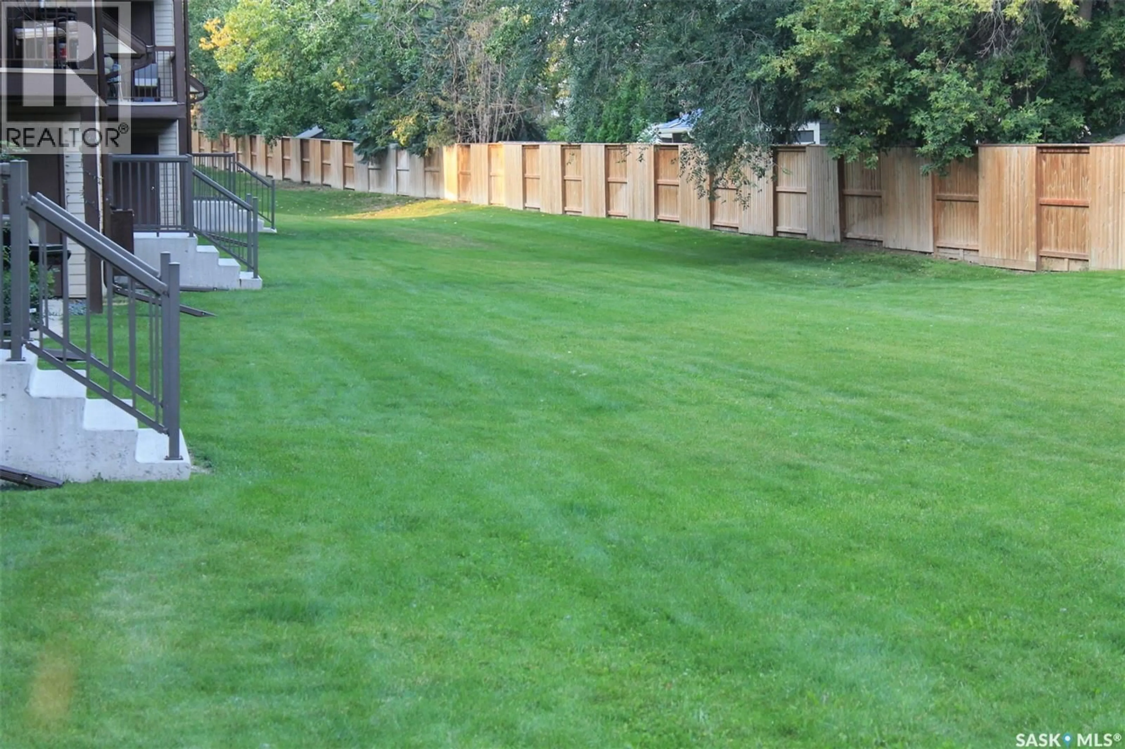 A pic from outside/outdoor area/front of a property/back of a property/a pic from drone, street for B4 - 375 KINGSMERE BOULEVARD, Saskatoon Saskatchewan S7J4J6