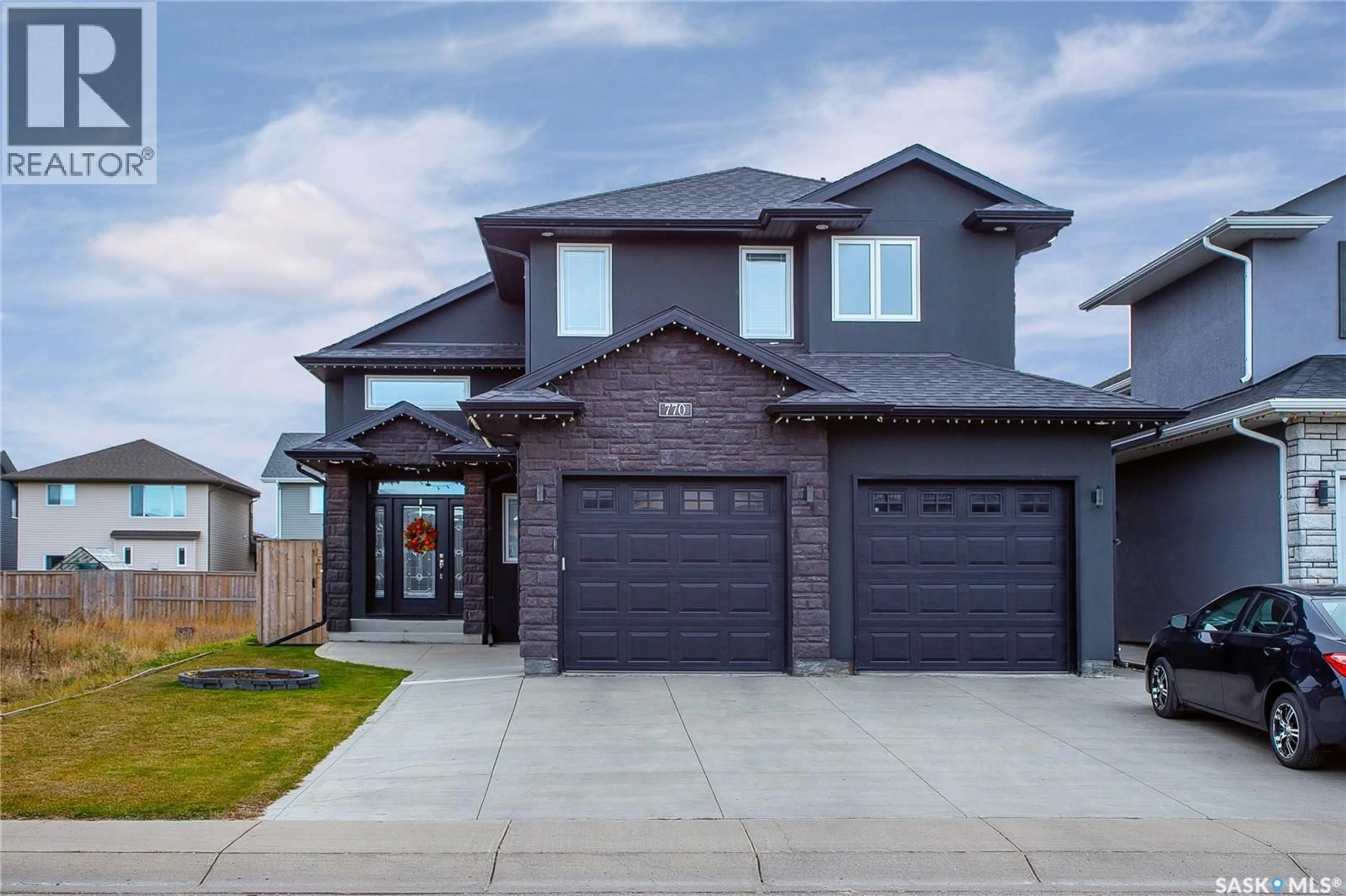 Home with brick exterior material, street for 770 LABINE COURT, Saskatoon Saskatchewan S7L6G7