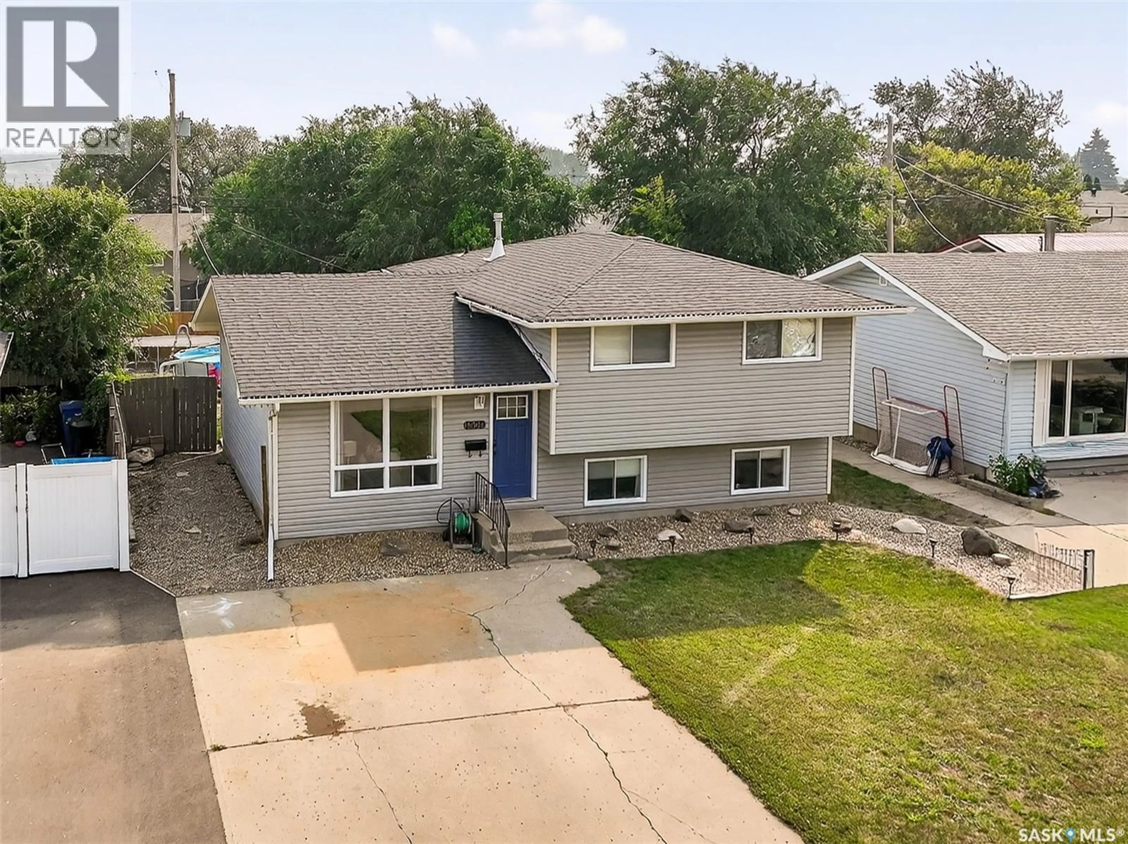 A pic from outside/outdoor area/front of a property/back of a property/a pic from drone, street for 1309 HOCHELAGA STREET, Moose Jaw Saskatchewan S6H6C3