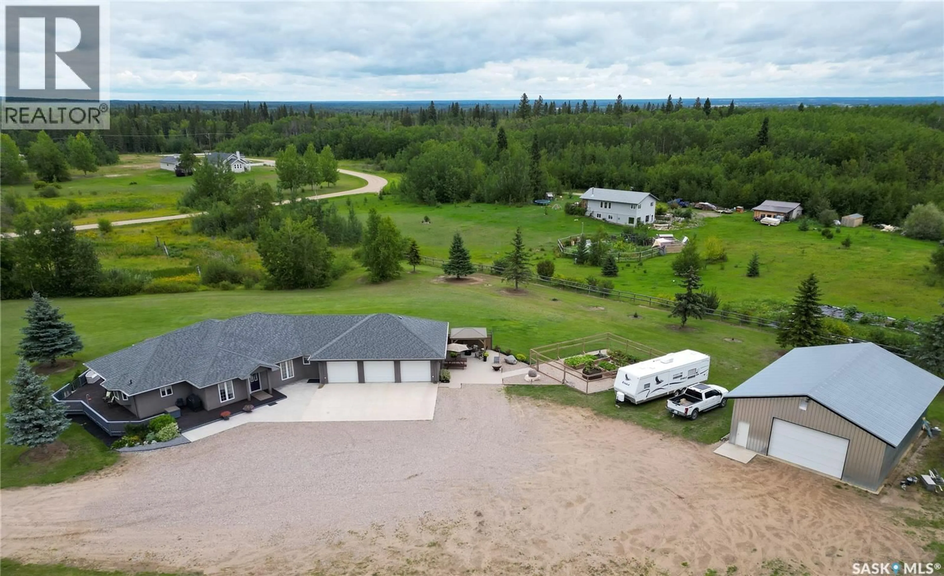A pic from outside/outdoor area/front of a property/back of a property/a pic from drone, water/lake/river/ocean view for 350 RIDGEWAY ROAD, Christopher Lake Saskatchewan S0J0N0