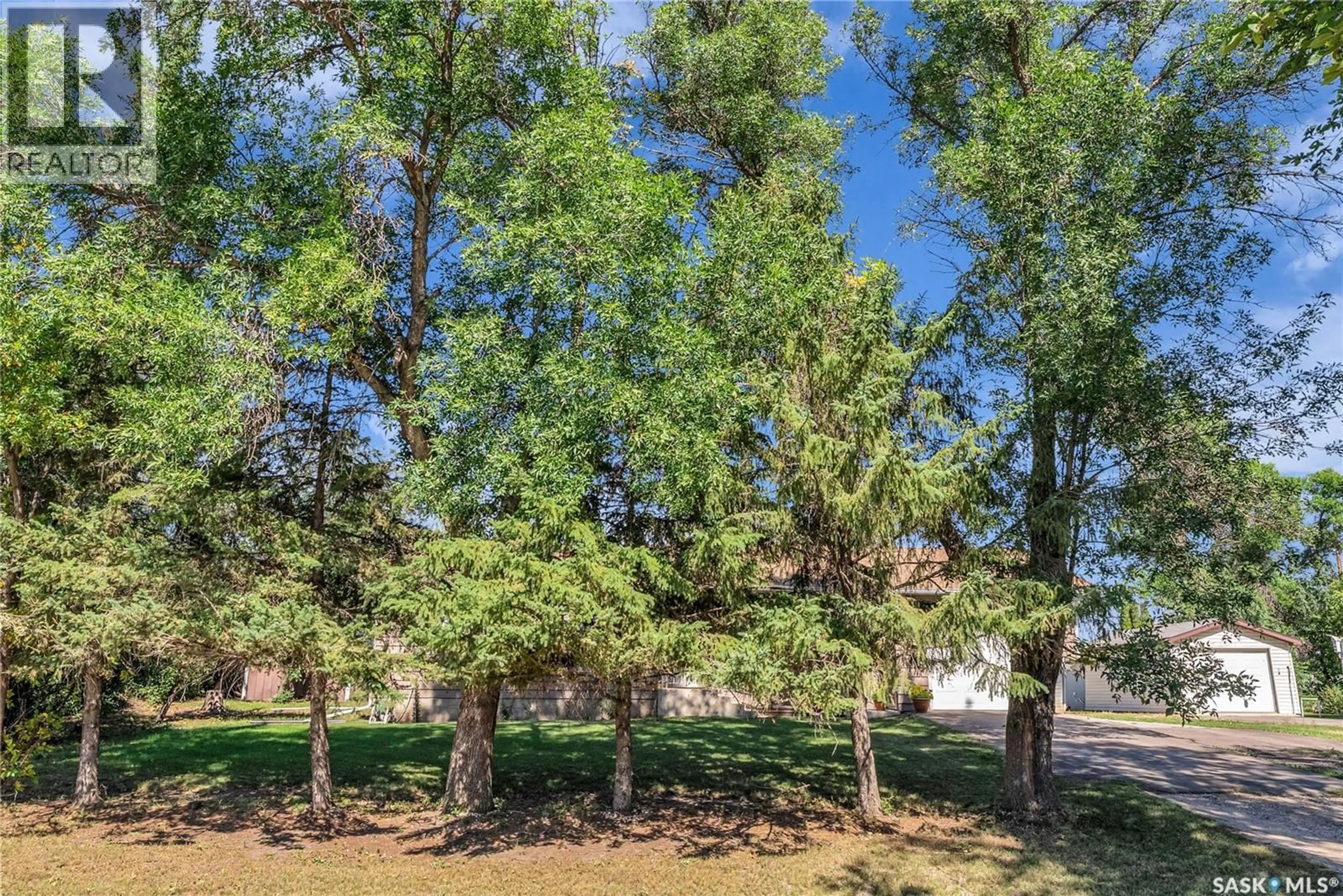 A pic from outside/outdoor area/front of a property/back of a property/a pic from drone, forest/trees view for 604 KING STREET, Imperial Saskatchewan S0G2J0