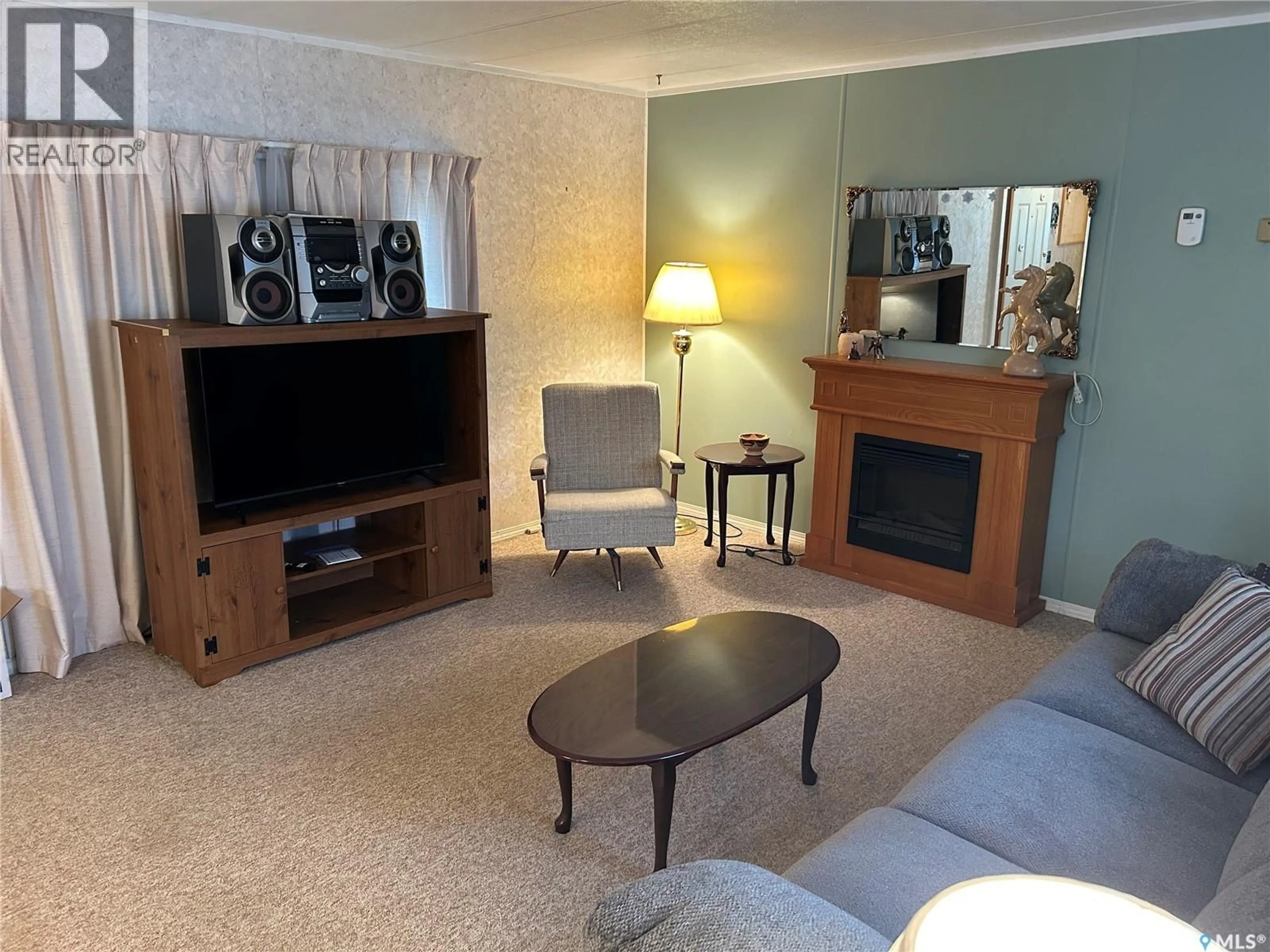 Living room with furniture, unknown for 111 ROULEAU STREET, Rouleau Saskatchewan S0G4H0