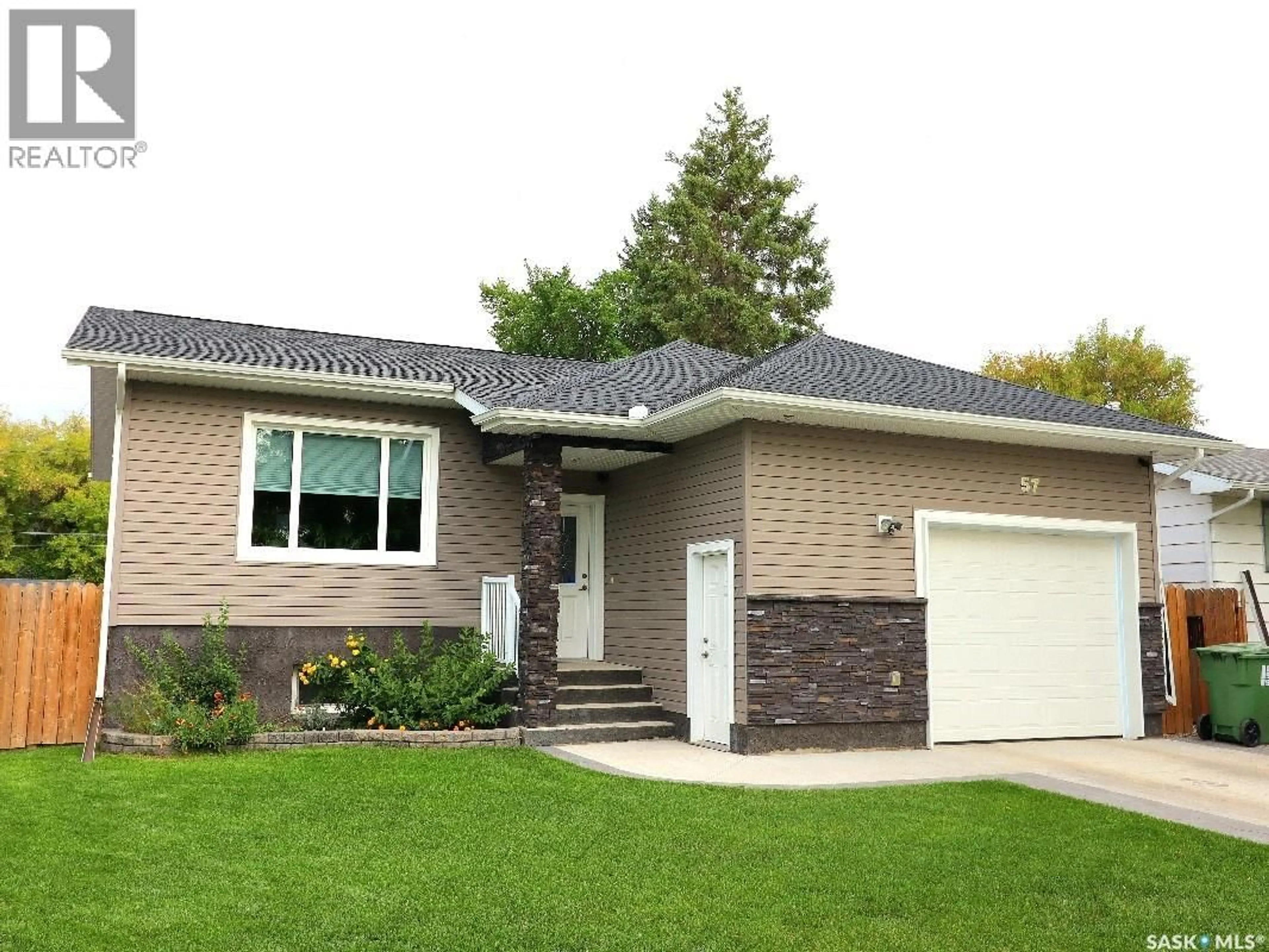 Home with vinyl exterior material, street for 57 MACFARLINE AVENUE, Yorkton Saskatchewan S3N2C5