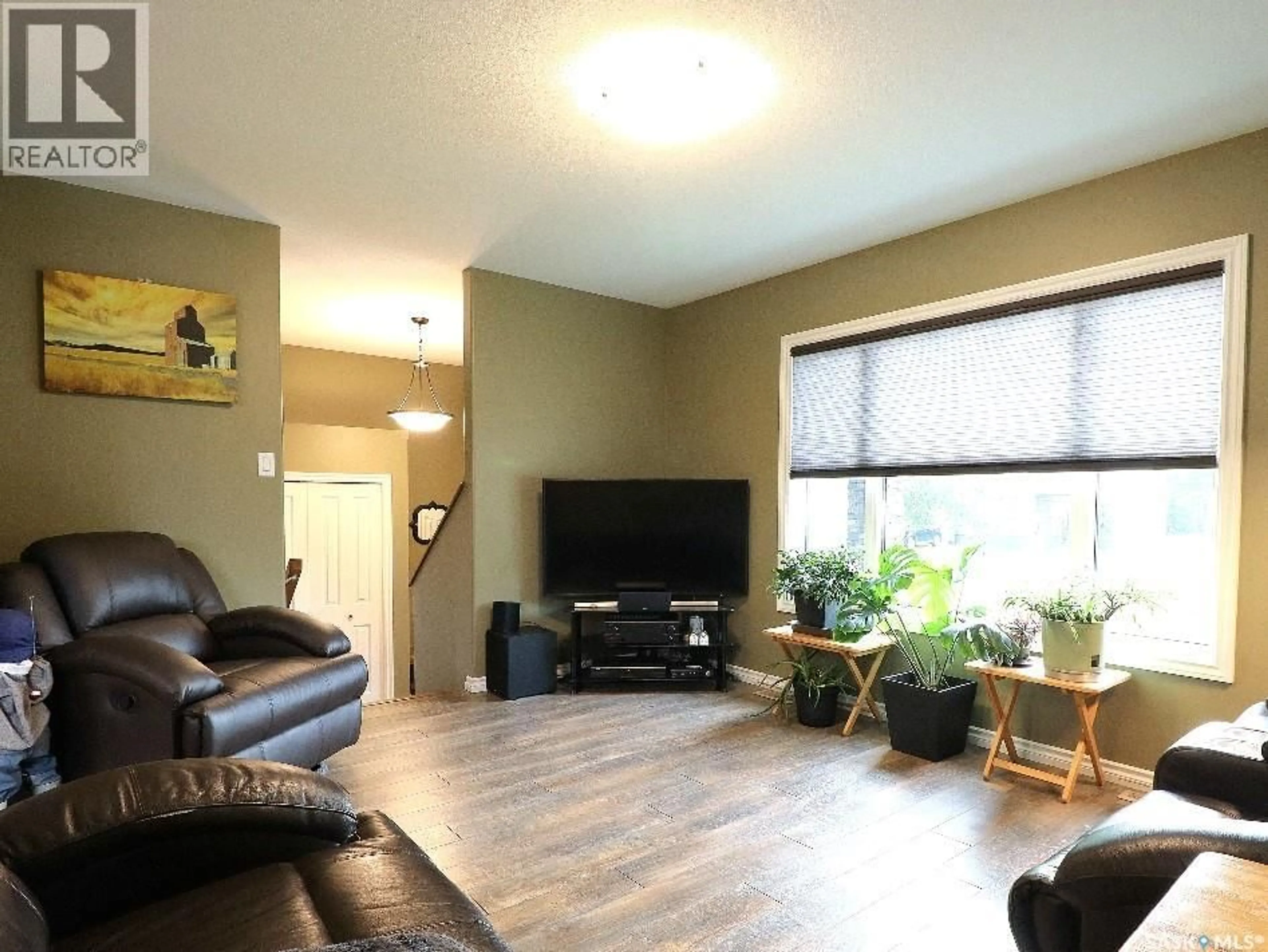 Living room with furniture, unknown for 57 MACFARLINE AVENUE, Yorkton Saskatchewan S3N2C5