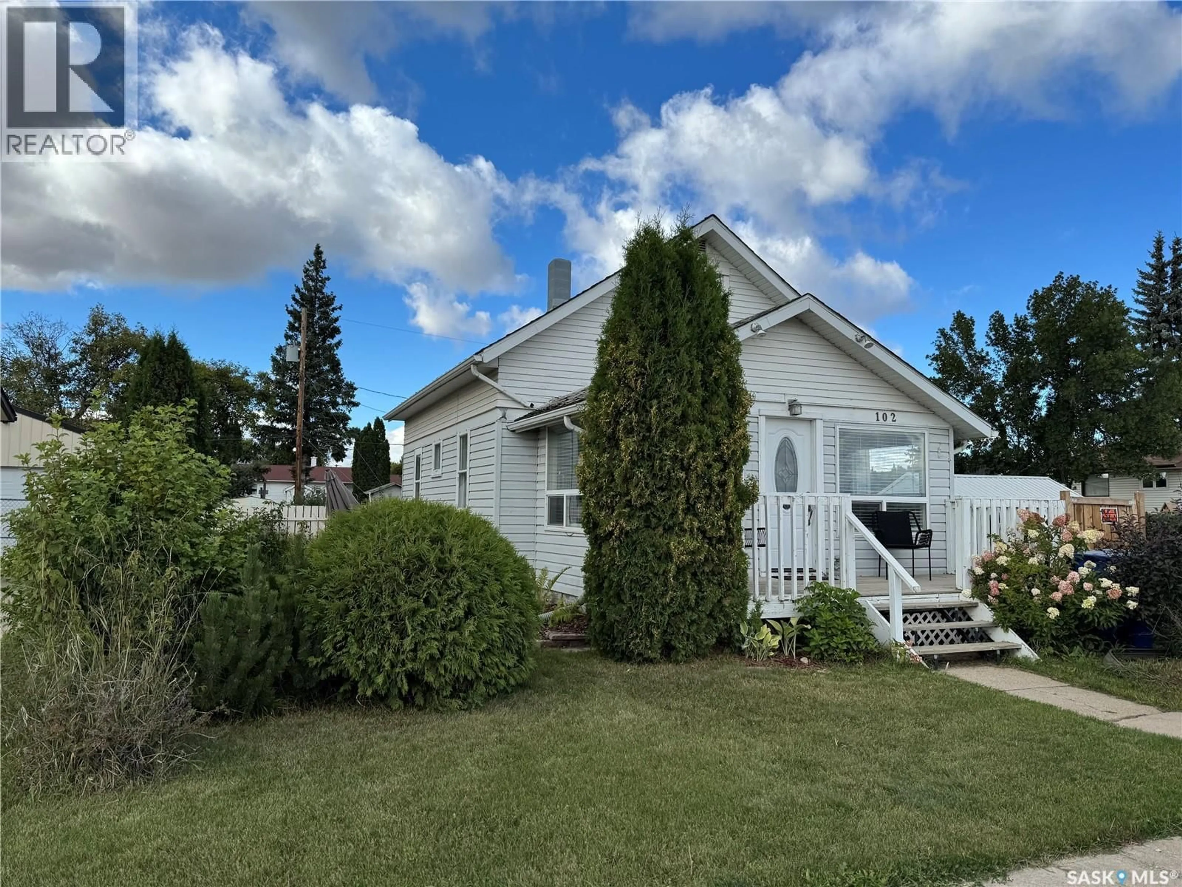 Home with vinyl exterior material, street for 102 5TH AVENUE, Blaine Lake Saskatchewan S0J0J0