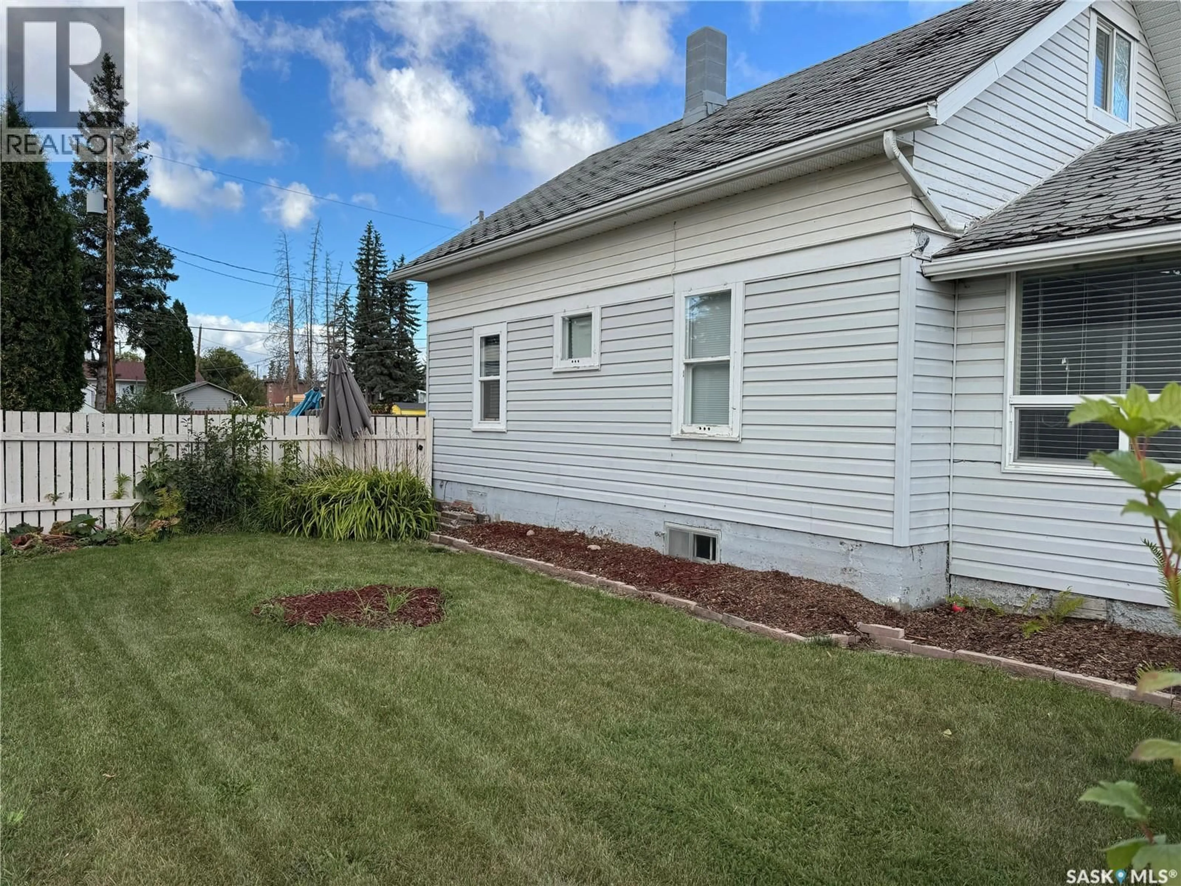 Home with vinyl exterior material, street for 102 5TH AVENUE, Blaine Lake Saskatchewan S0J0J0