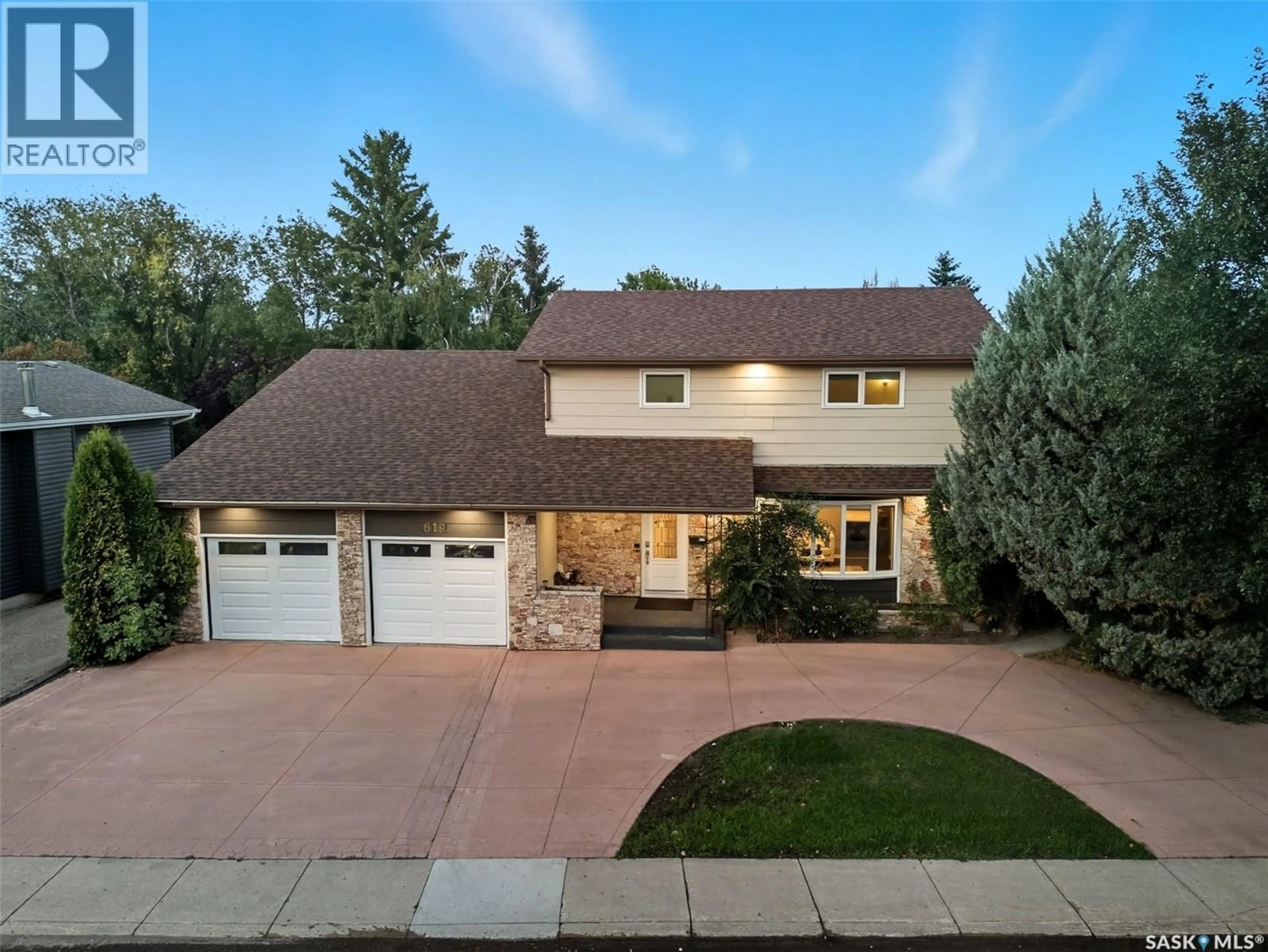 Home with brick exterior material, street for 619 KINGSMERE BOULEVARD, Saskatoon Saskatchewan S7J4E7