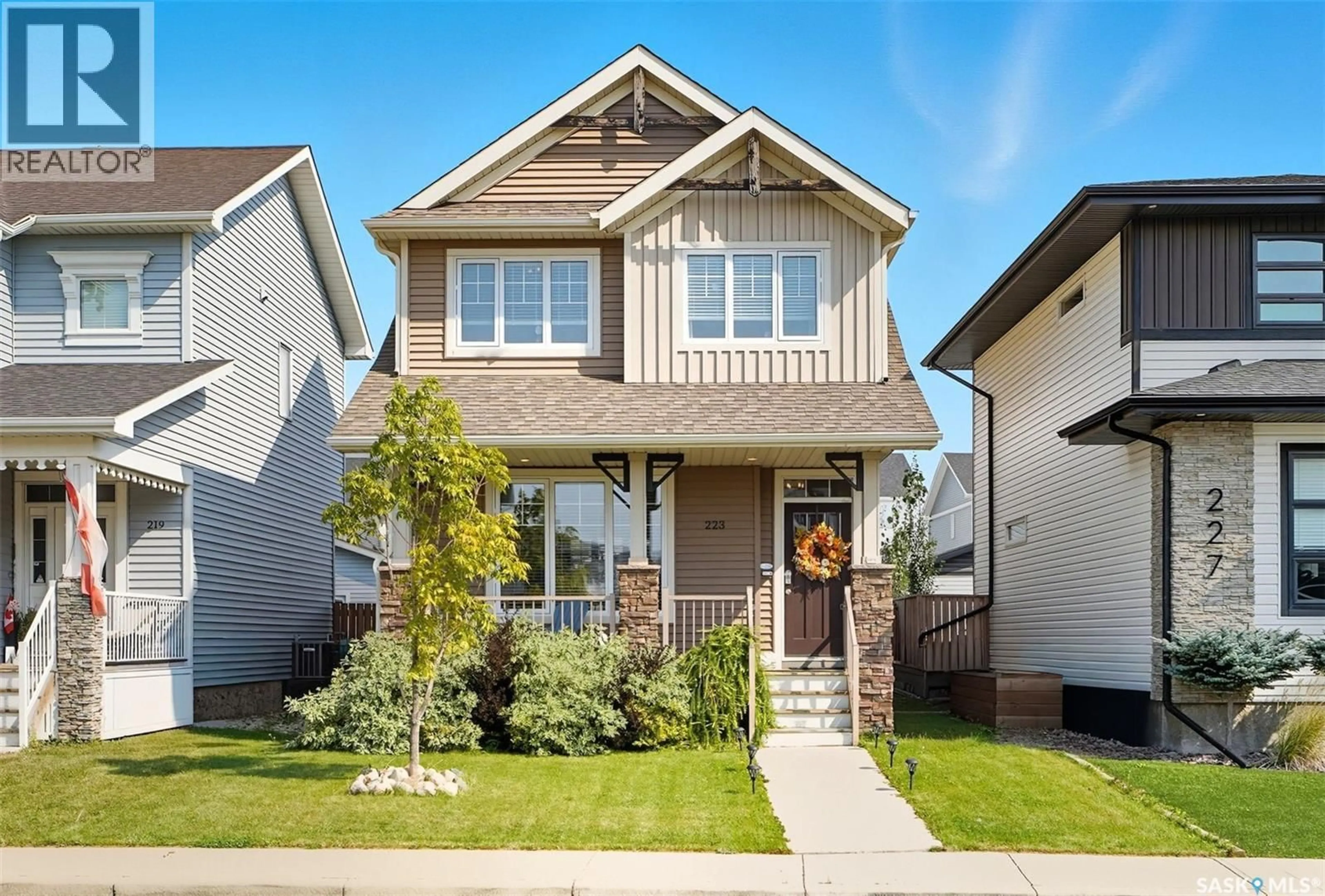 Home with vinyl exterior material, street for 223 SECORD WAY, Saskatoon Saskatchewan S7V0L9