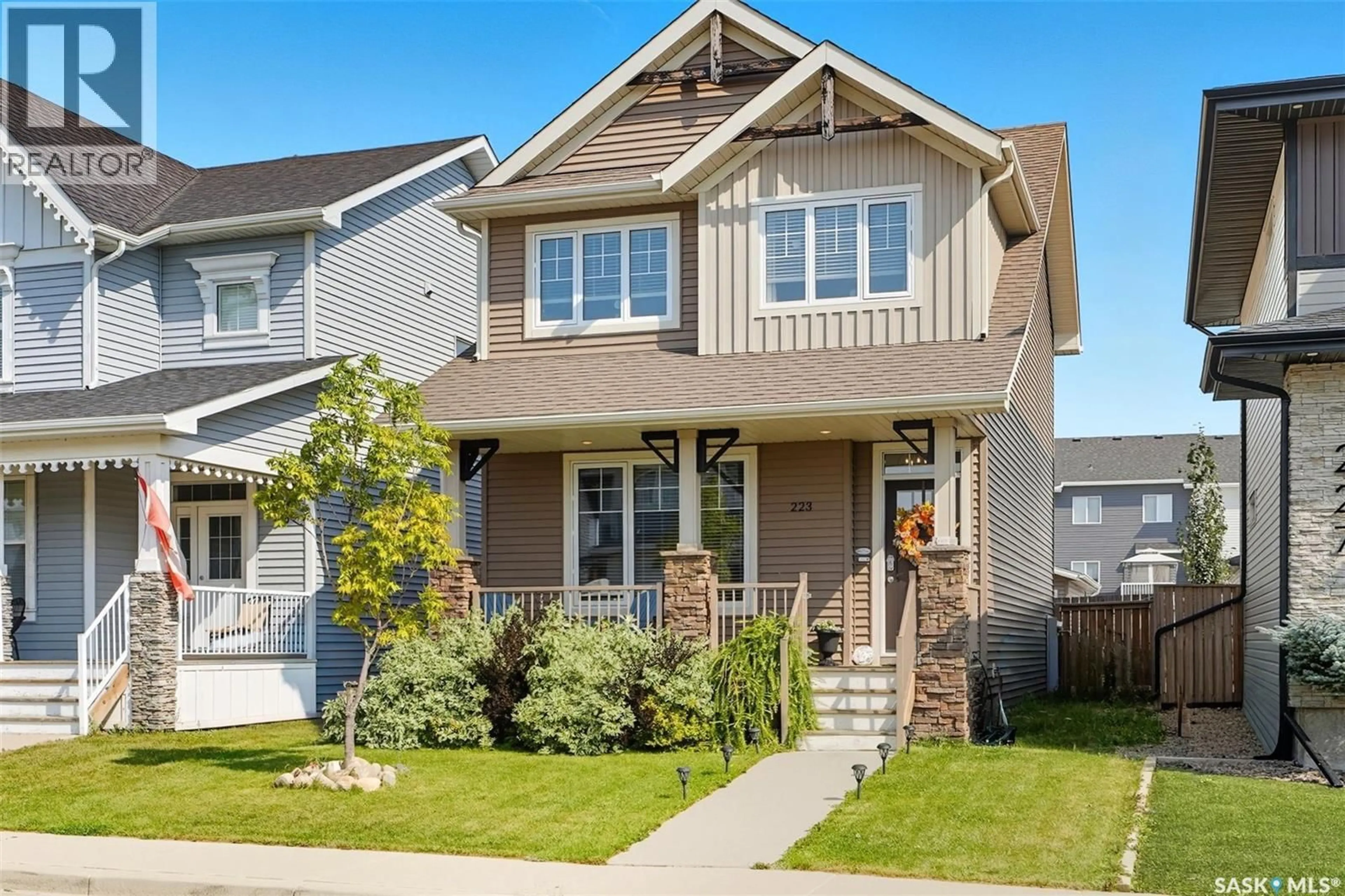 Home with vinyl exterior material, street for 223 SECORD WAY, Saskatoon Saskatchewan S7V0L9