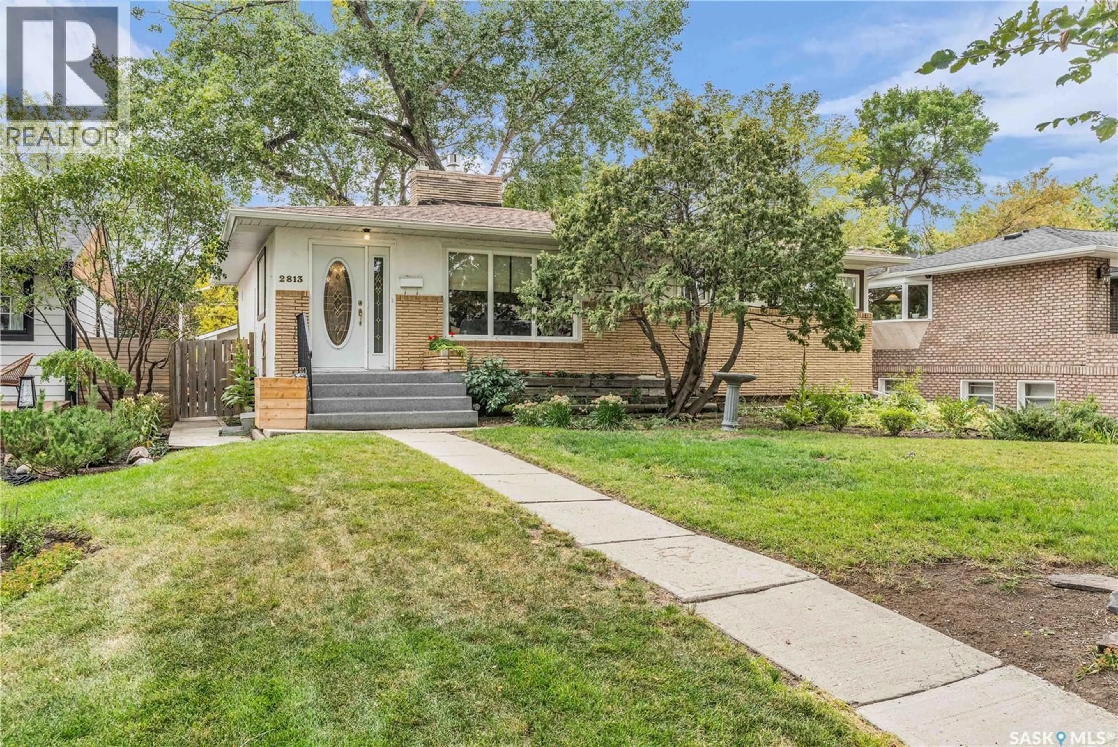 Home with brick exterior material, street for 2813 23RD AVENUE, Regina Saskatchewan S4S1E7