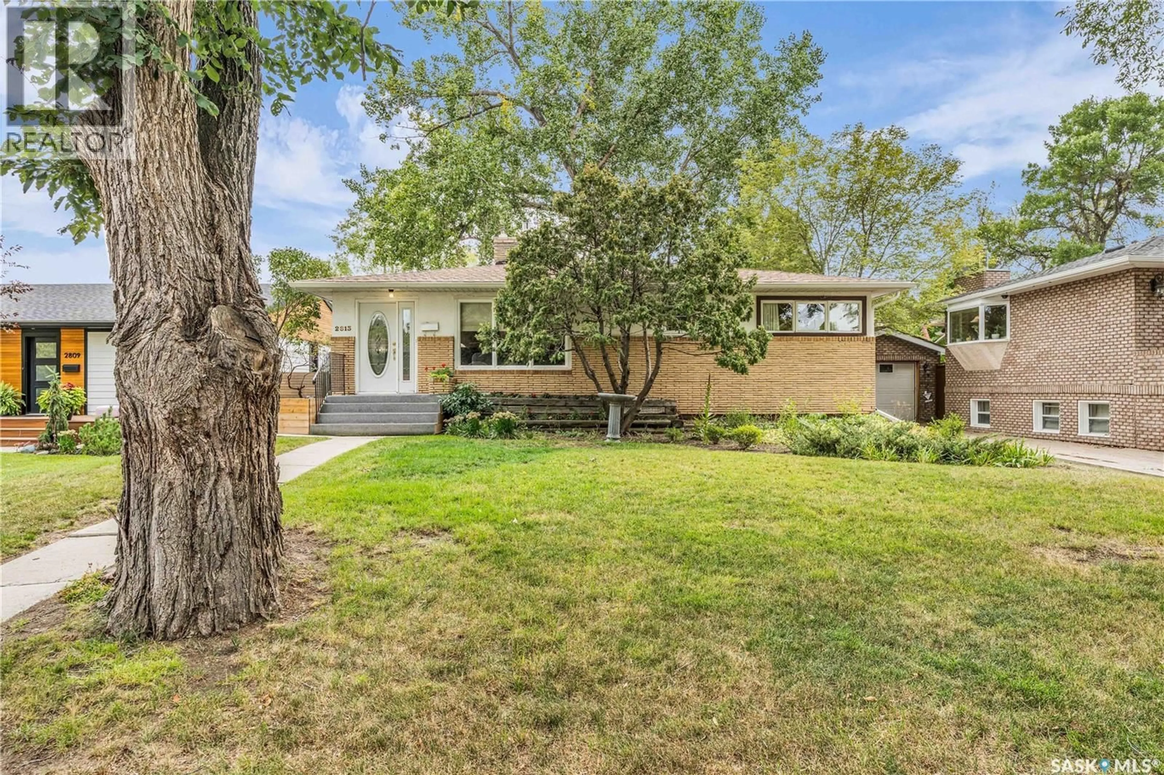 Home with brick exterior material, street for 2813 23RD AVENUE, Regina Saskatchewan S4S1E7