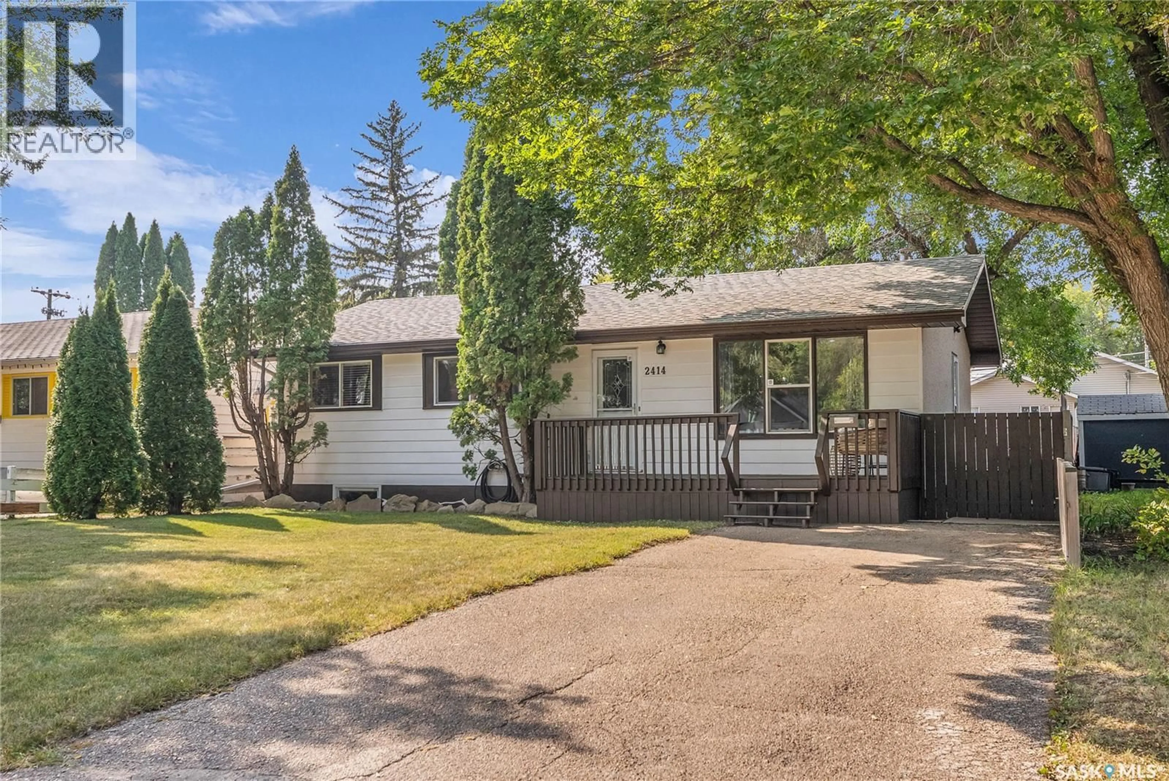 Home with vinyl exterior material, street for 2414 MCPHERSON AVENUE, Saskatoon Saskatchewan S7J0S9