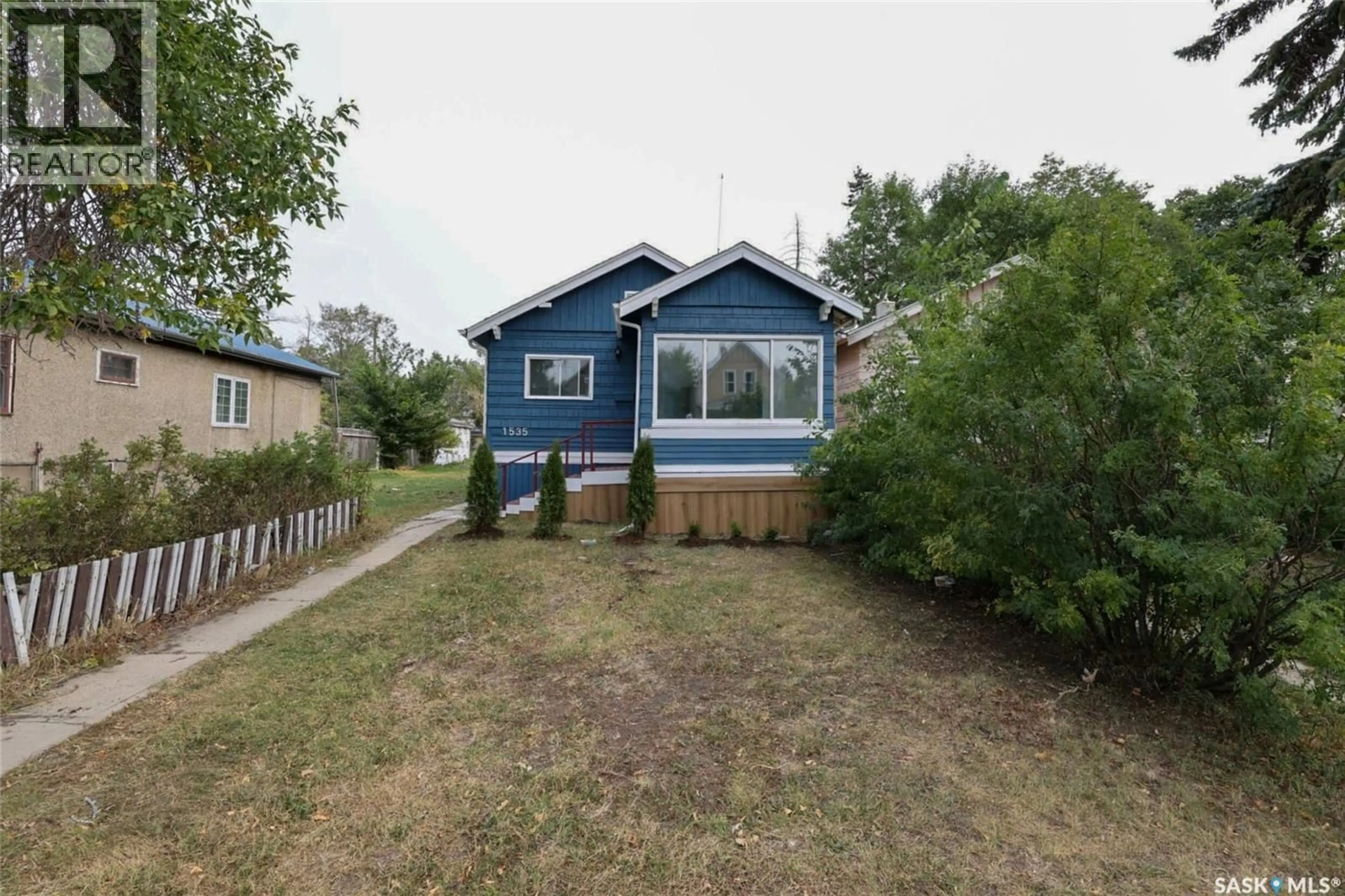 Home with vinyl exterior material, street for 1535 CAMERON STREET, Regina Saskatchewan S4T2T7