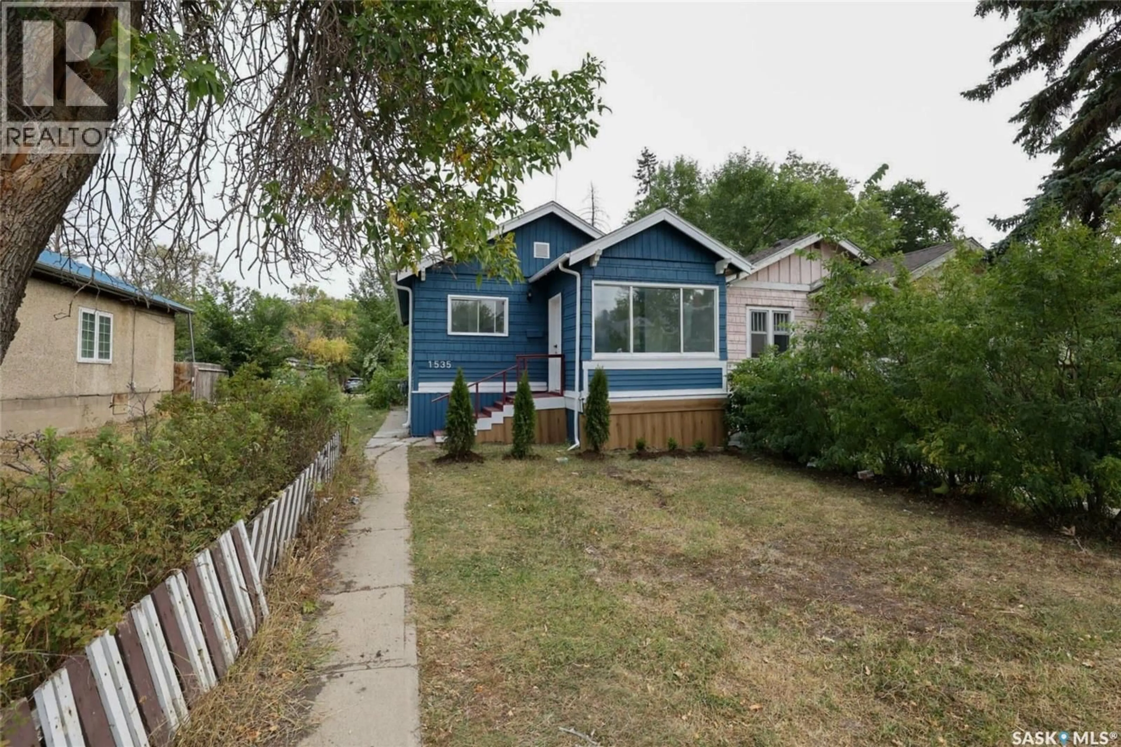 Home with vinyl exterior material, street for 1535 CAMERON STREET, Regina Saskatchewan S4T2T7