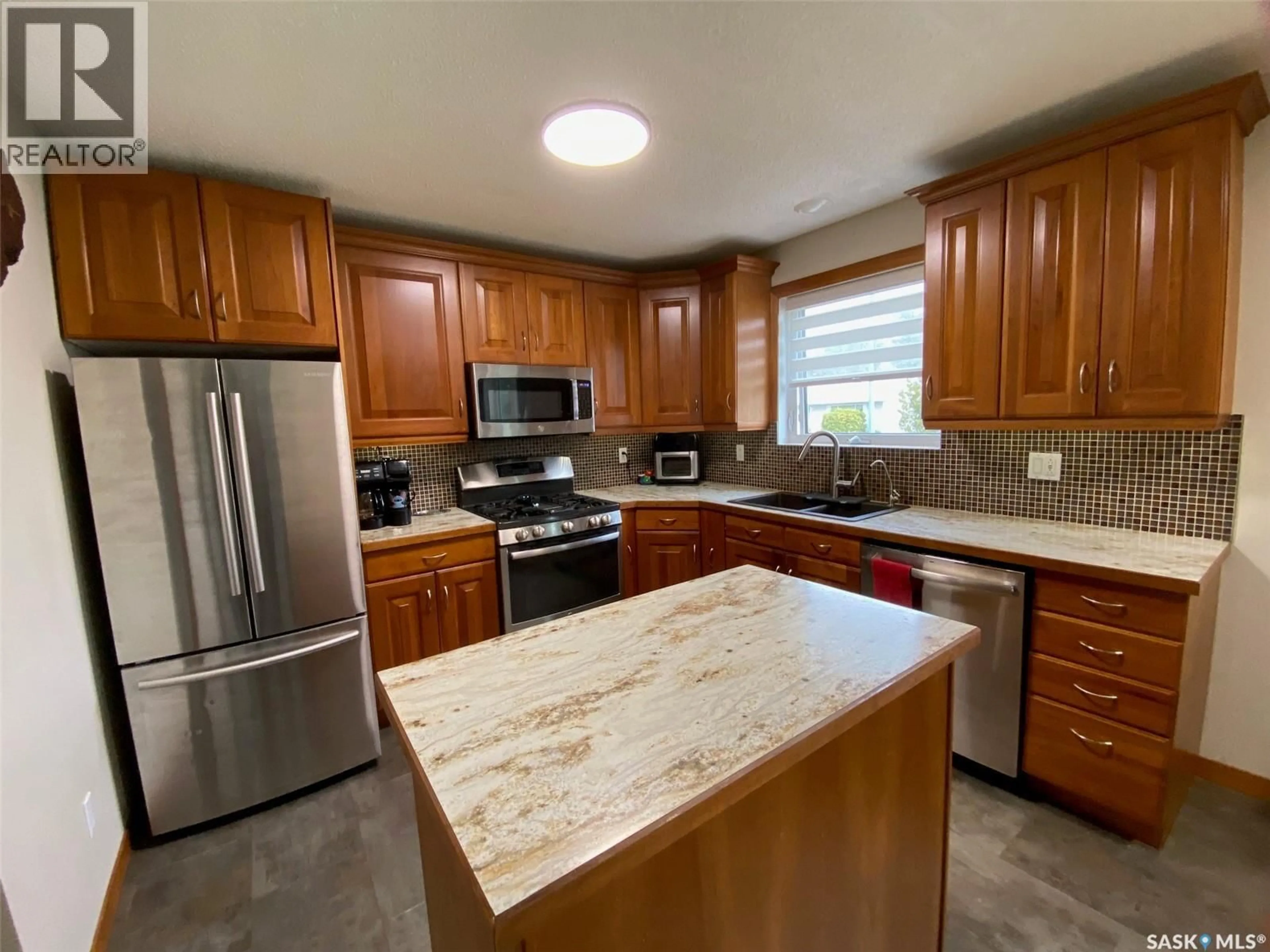 Open concept kitchen, ceramic/tile floor for 38 CHARLESWOOD CRESCENT, Yorkton Saskatchewan S3N2R6