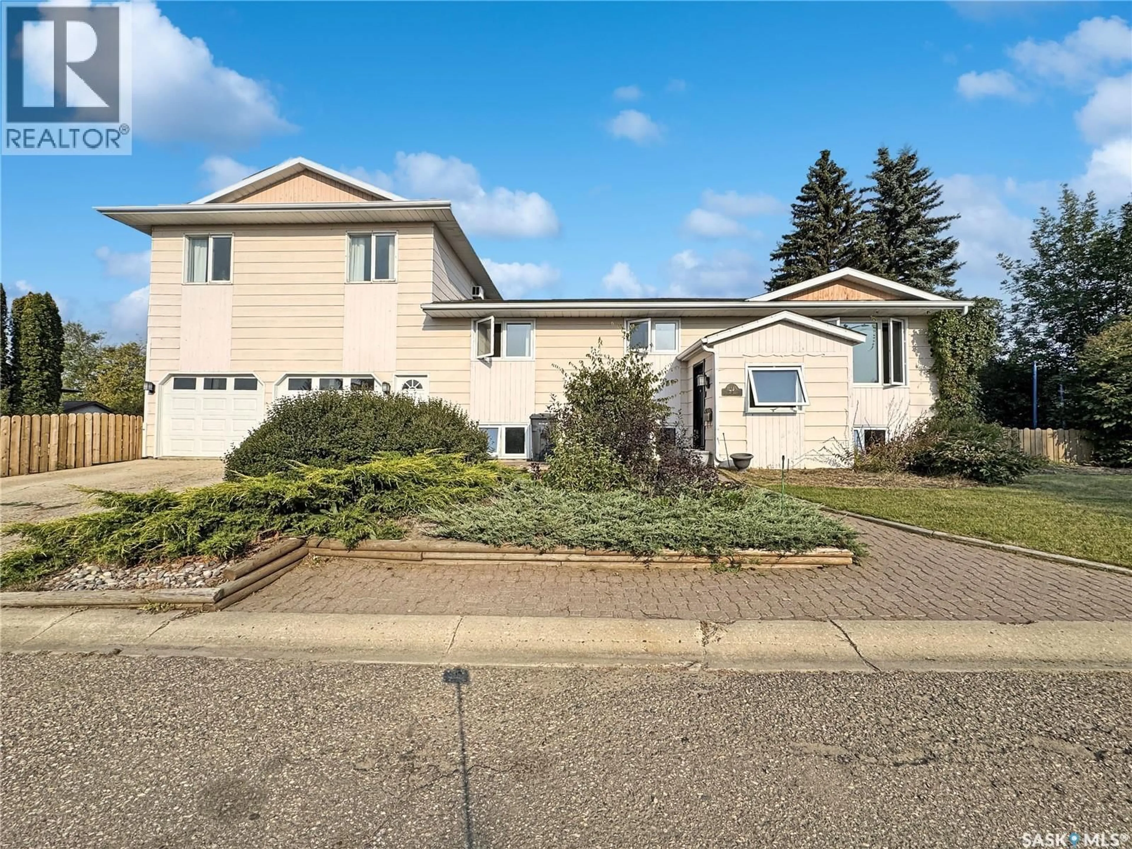 Home with vinyl exterior material, street for 11345 CLARK DRIVE, North Battleford Saskatchewan S9A3P6
