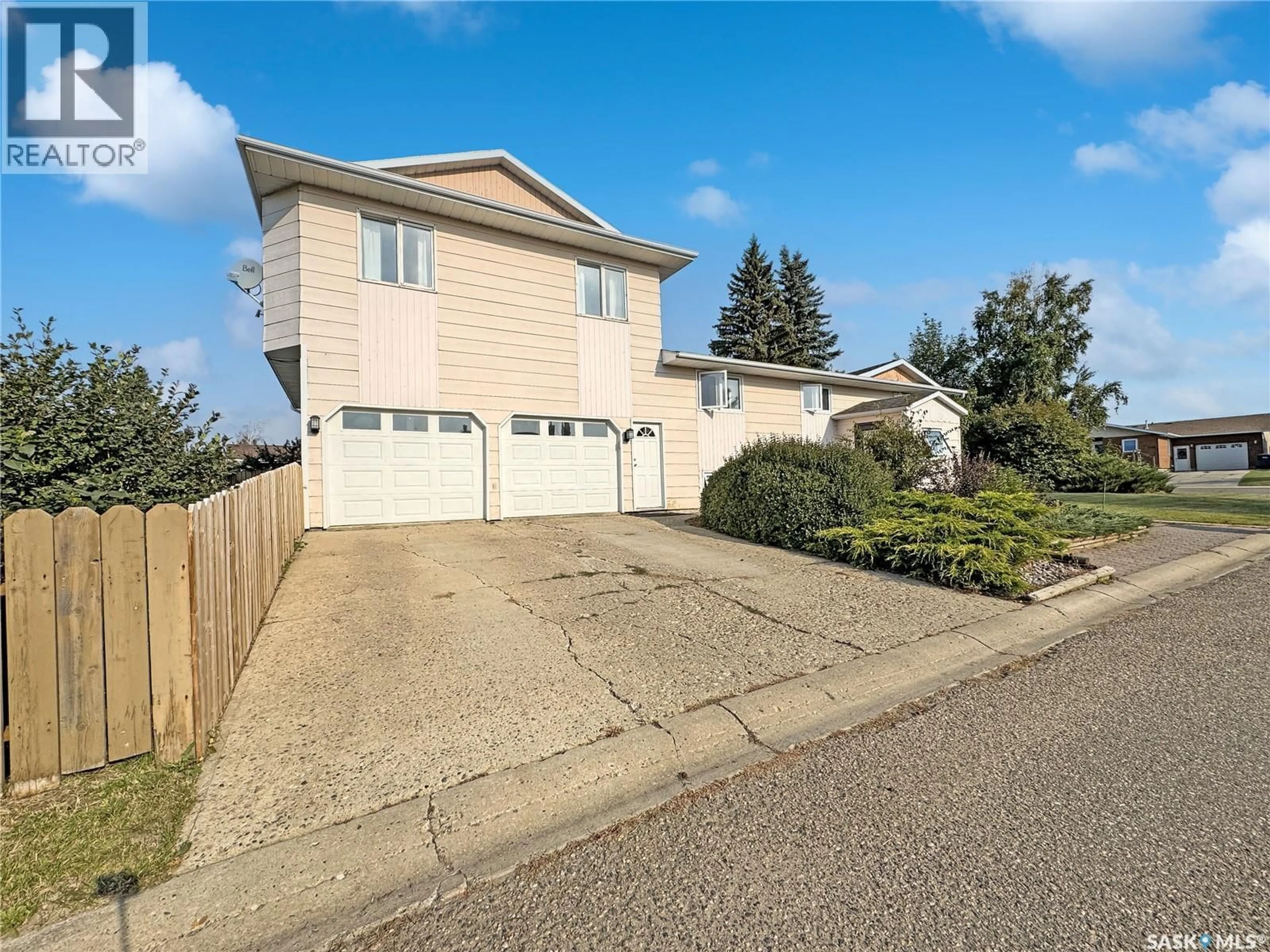Home with vinyl exterior material, street for 11345 CLARK DRIVE, North Battleford Saskatchewan S9A3P6