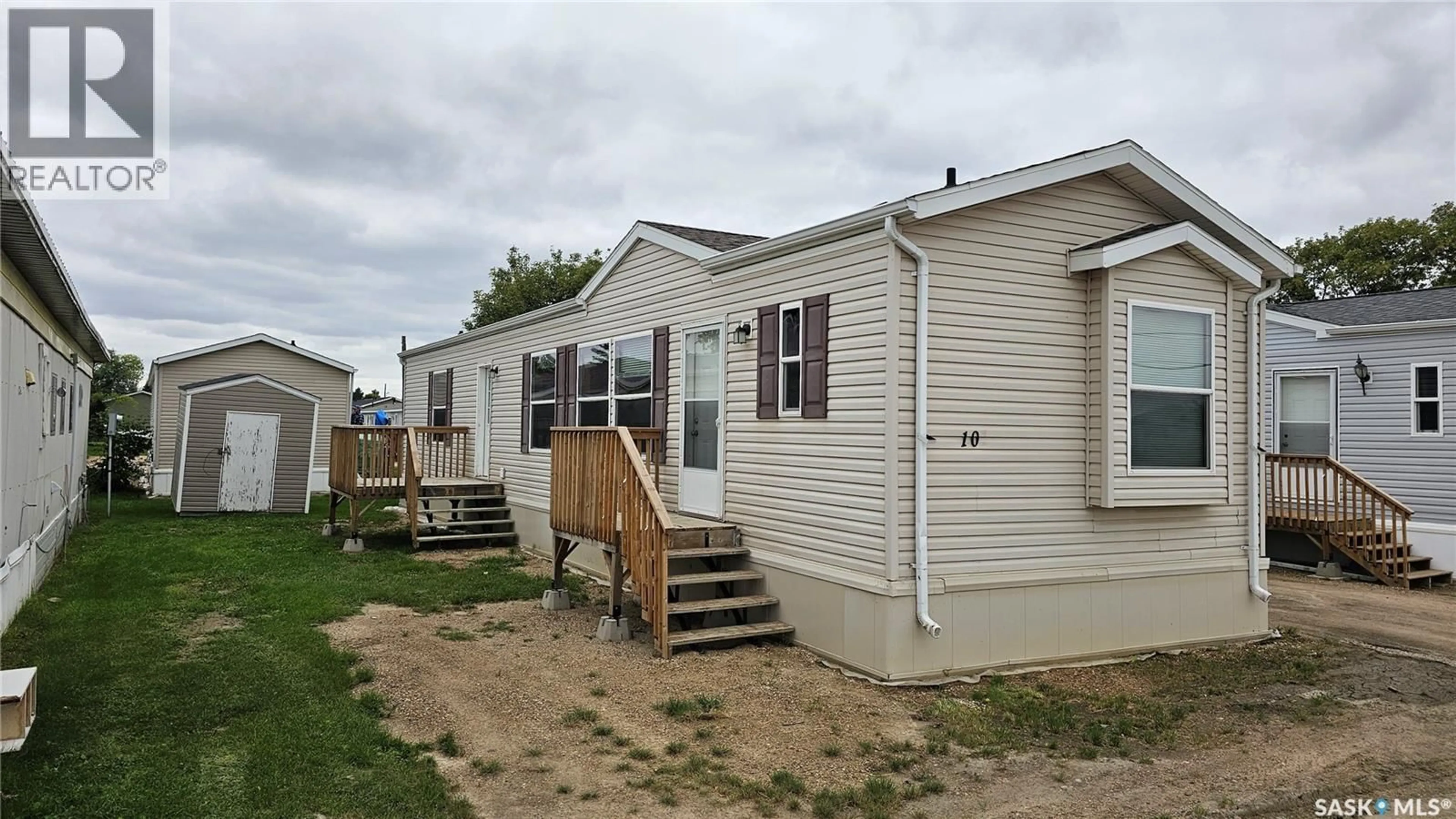 Home with vinyl exterior material, street for 10 SOUTHERN PINE ACRES, Humboldt Saskatchewan S0K2A0
