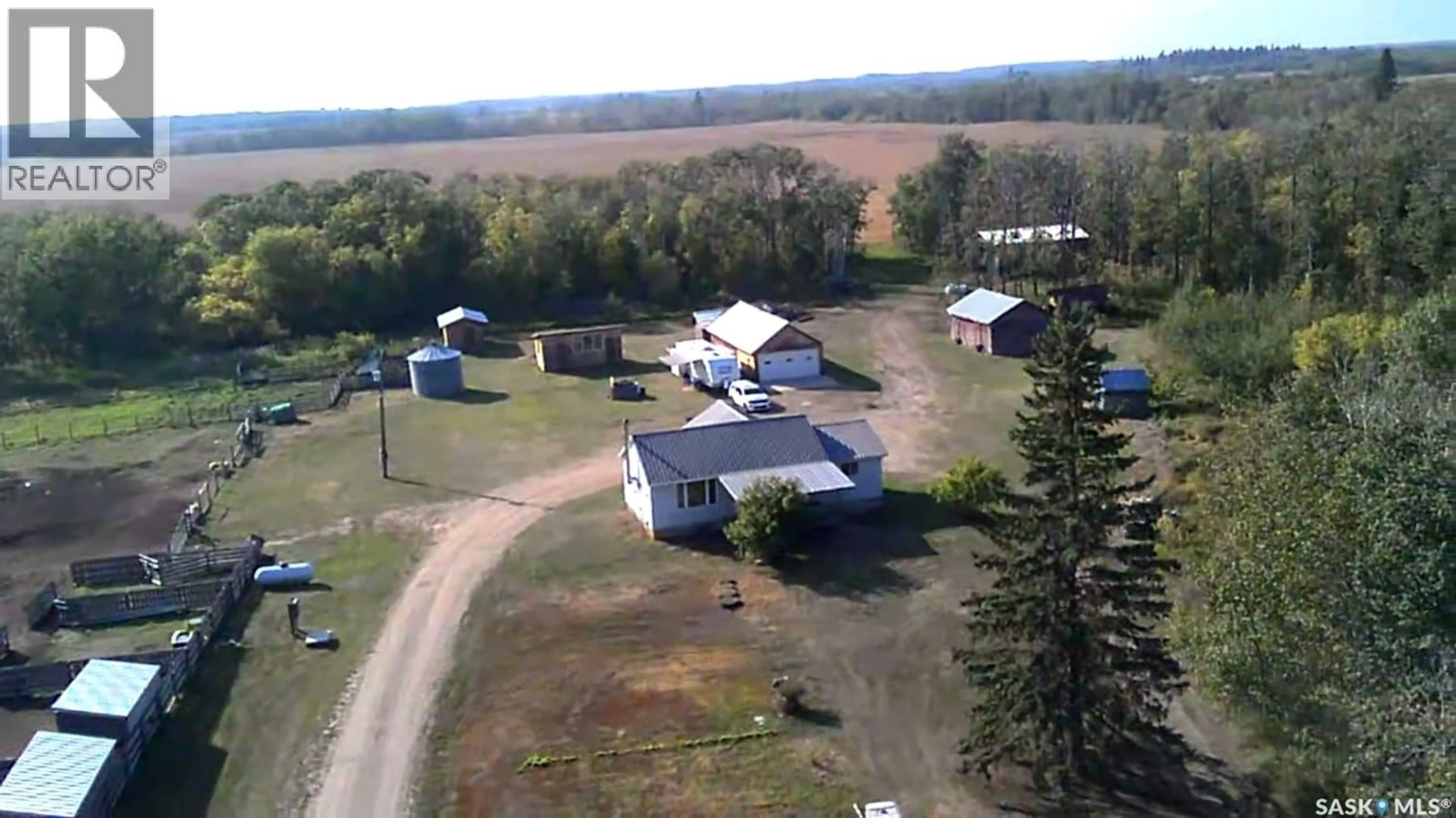 A pic from outside/outdoor area/front of a property/back of a property/a pic from drone, unknown for EVERGREEN ACREAGE, Leask Rm No. 464 Saskatchewan S0J1M0