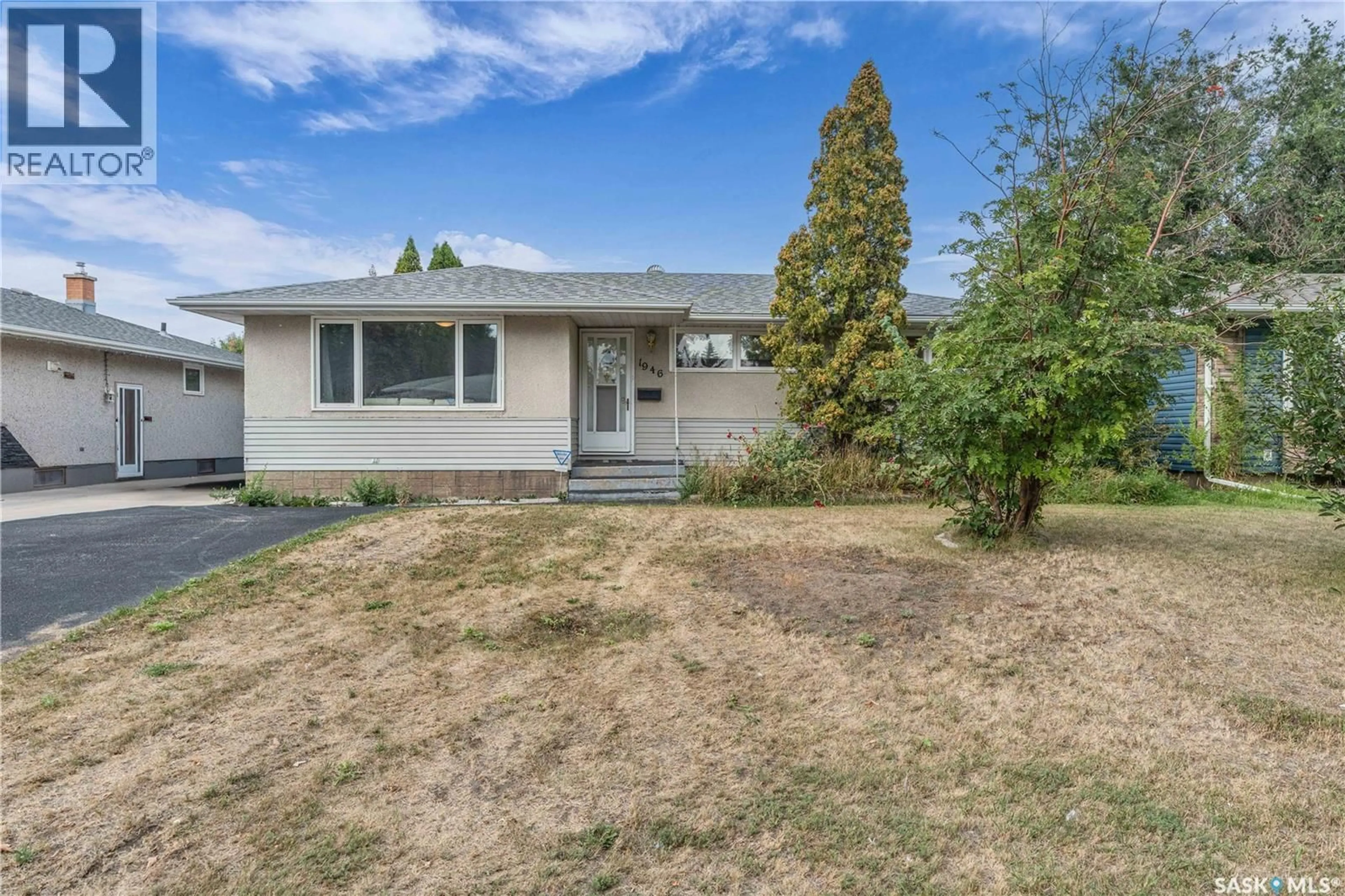 Home with vinyl exterior material, street for 1946 8TH AVENUE, Regina Saskatchewan S4R0G6