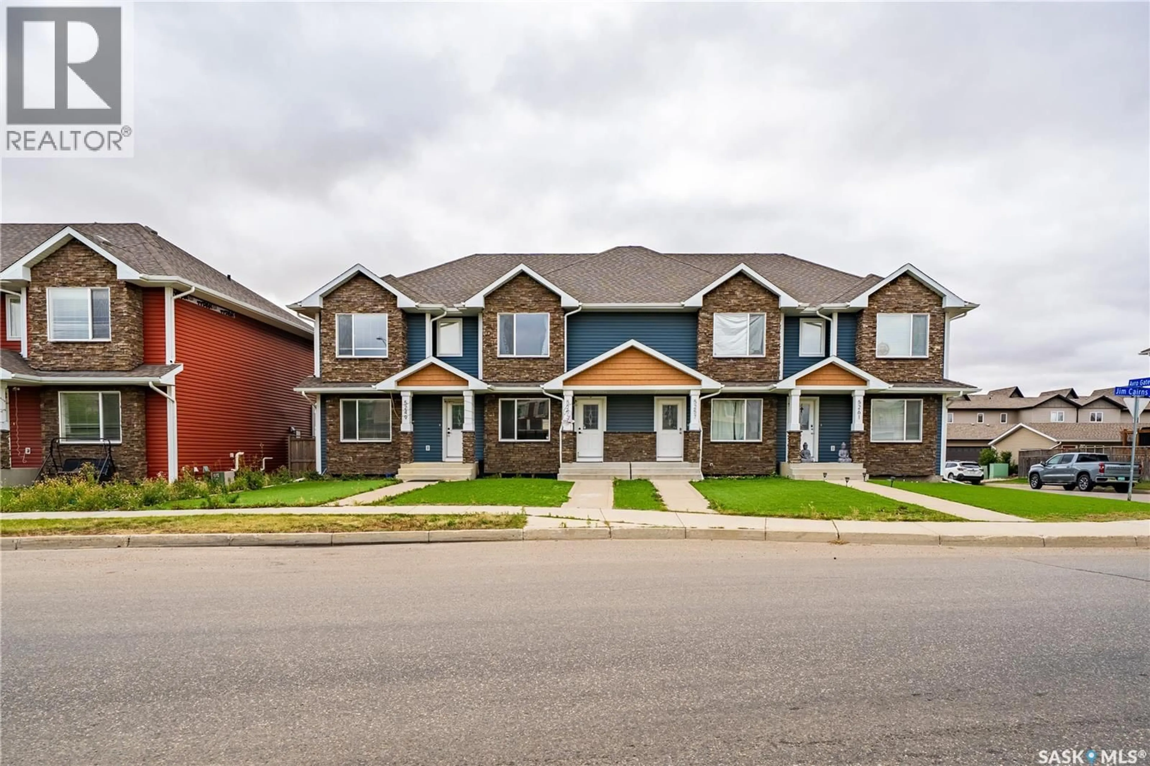 Home with brick exterior material, street for 5253 JIM CAIRNS BOULEVARD, Regina Saskatchewan S4W0G7