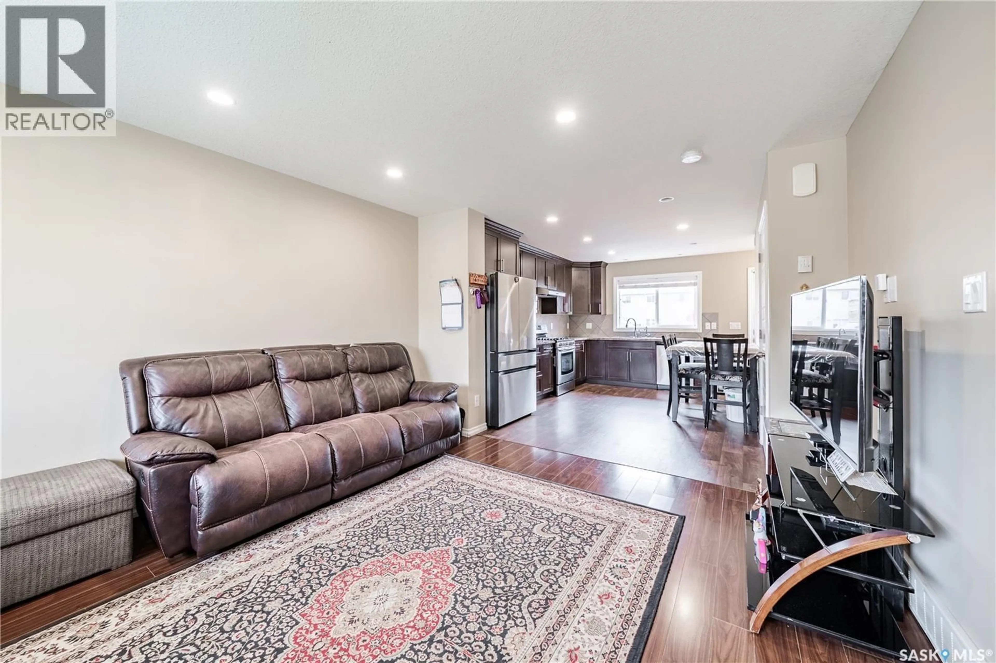 Living room with furniture, unknown for 5253 JIM CAIRNS BOULEVARD, Regina Saskatchewan S4W0G7