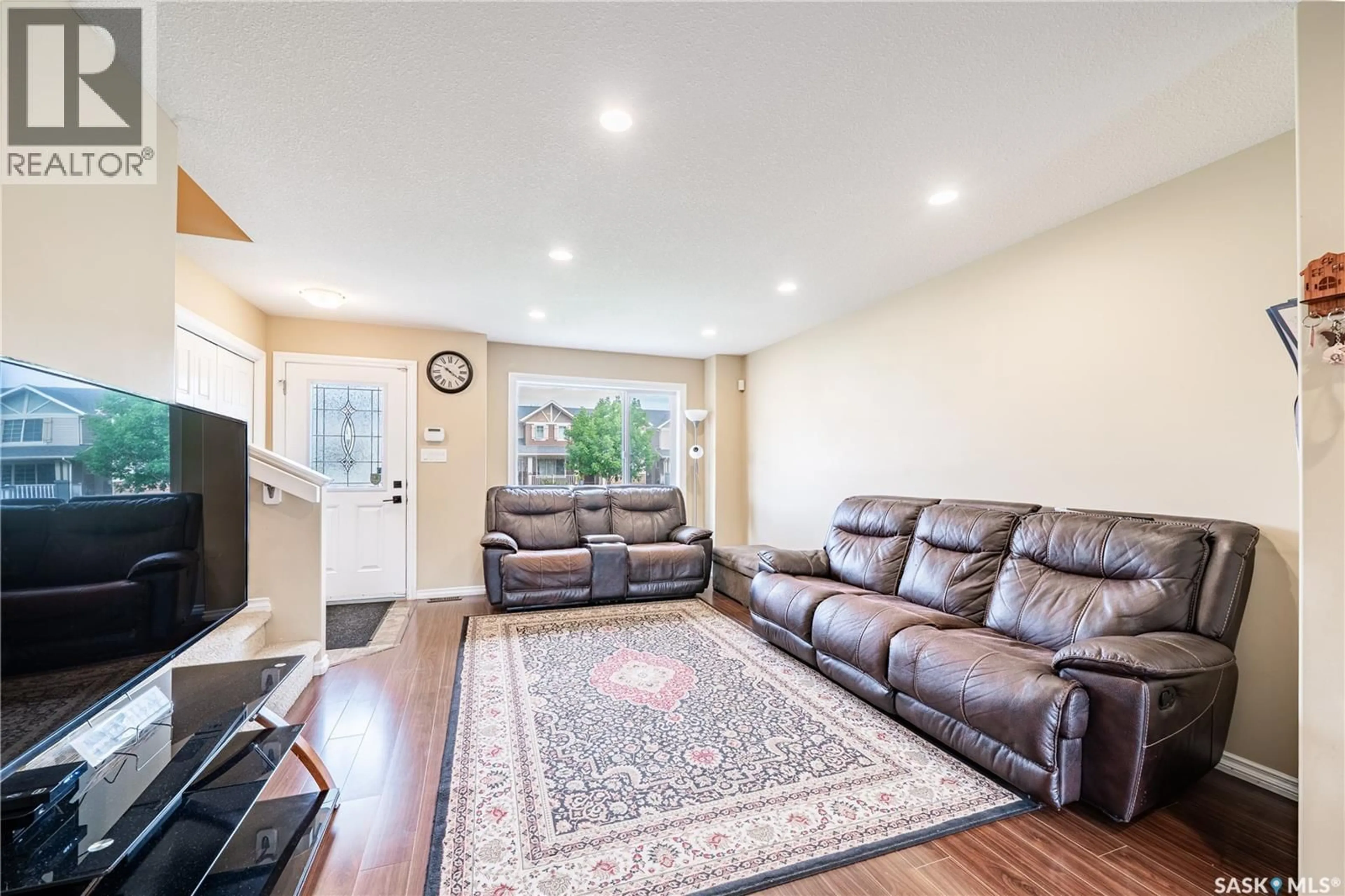 Living room with furniture, unknown for 5253 JIM CAIRNS BOULEVARD, Regina Saskatchewan S4W0G7