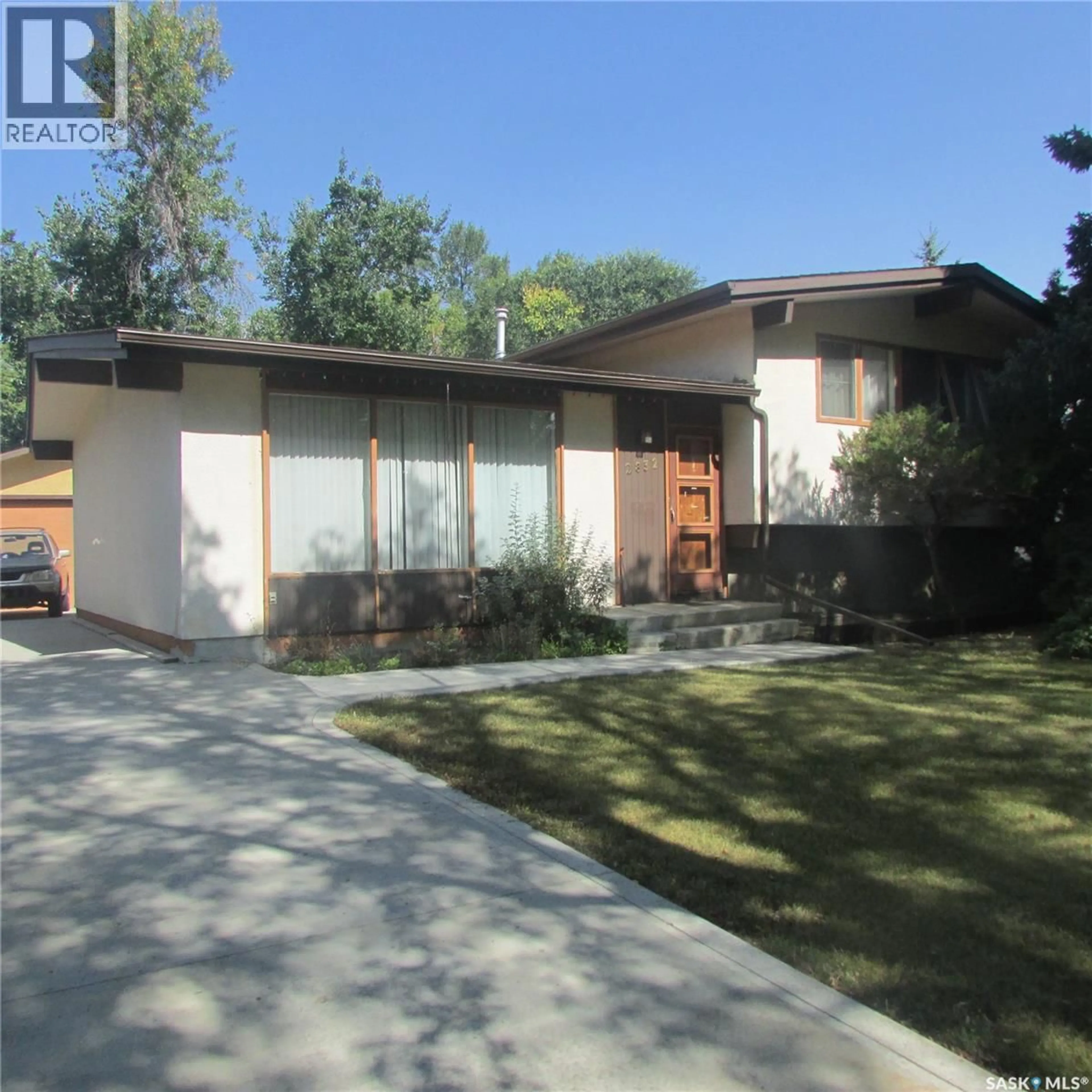 Home with brick exterior material, street for 2832 GRANT ROAD, Regina Saskatchewan S4S5G2