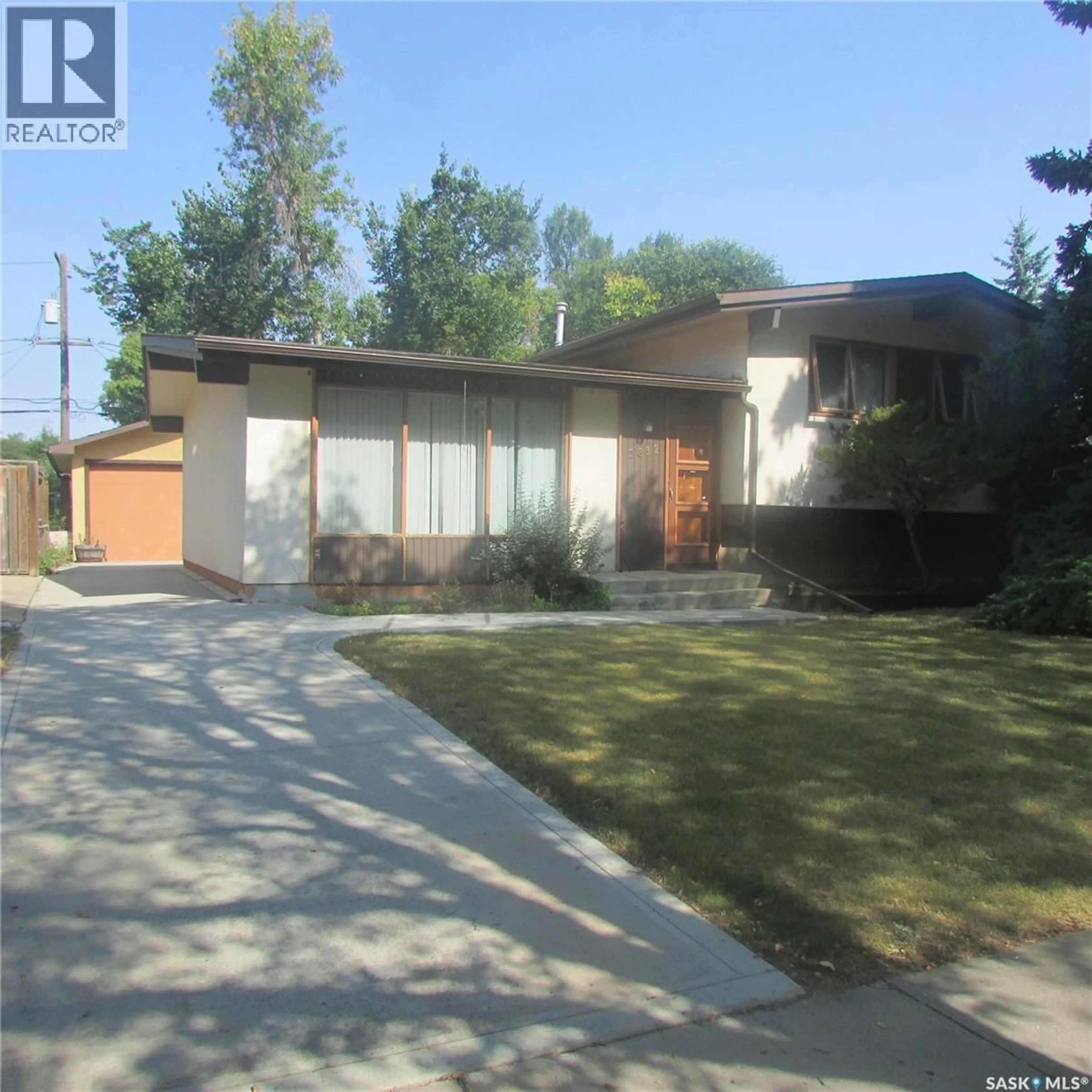 Home with brick exterior material, street for 2832 GRANT ROAD, Regina Saskatchewan S4S5G2