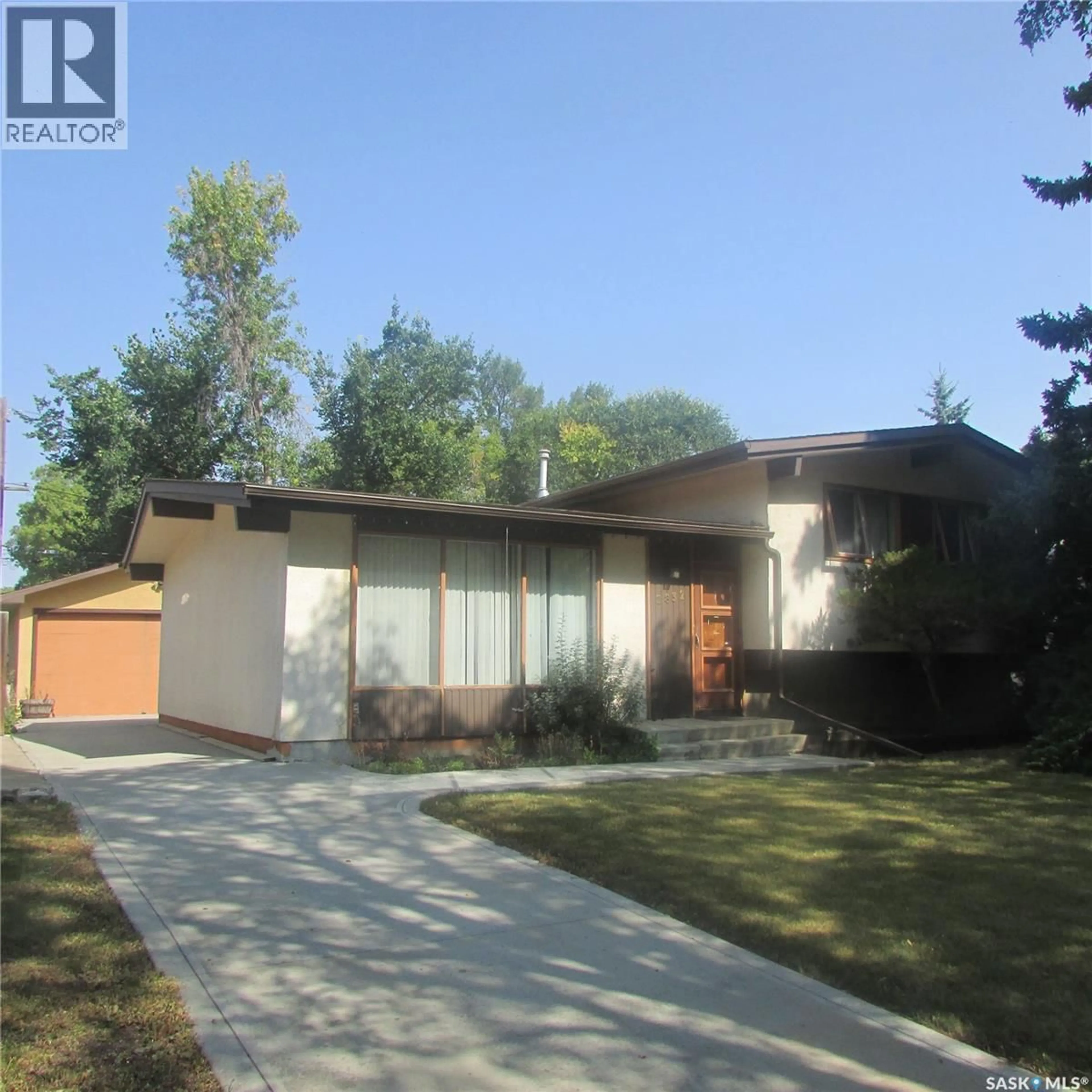 Home with brick exterior material, street for 2832 GRANT ROAD, Regina Saskatchewan S4S5G2