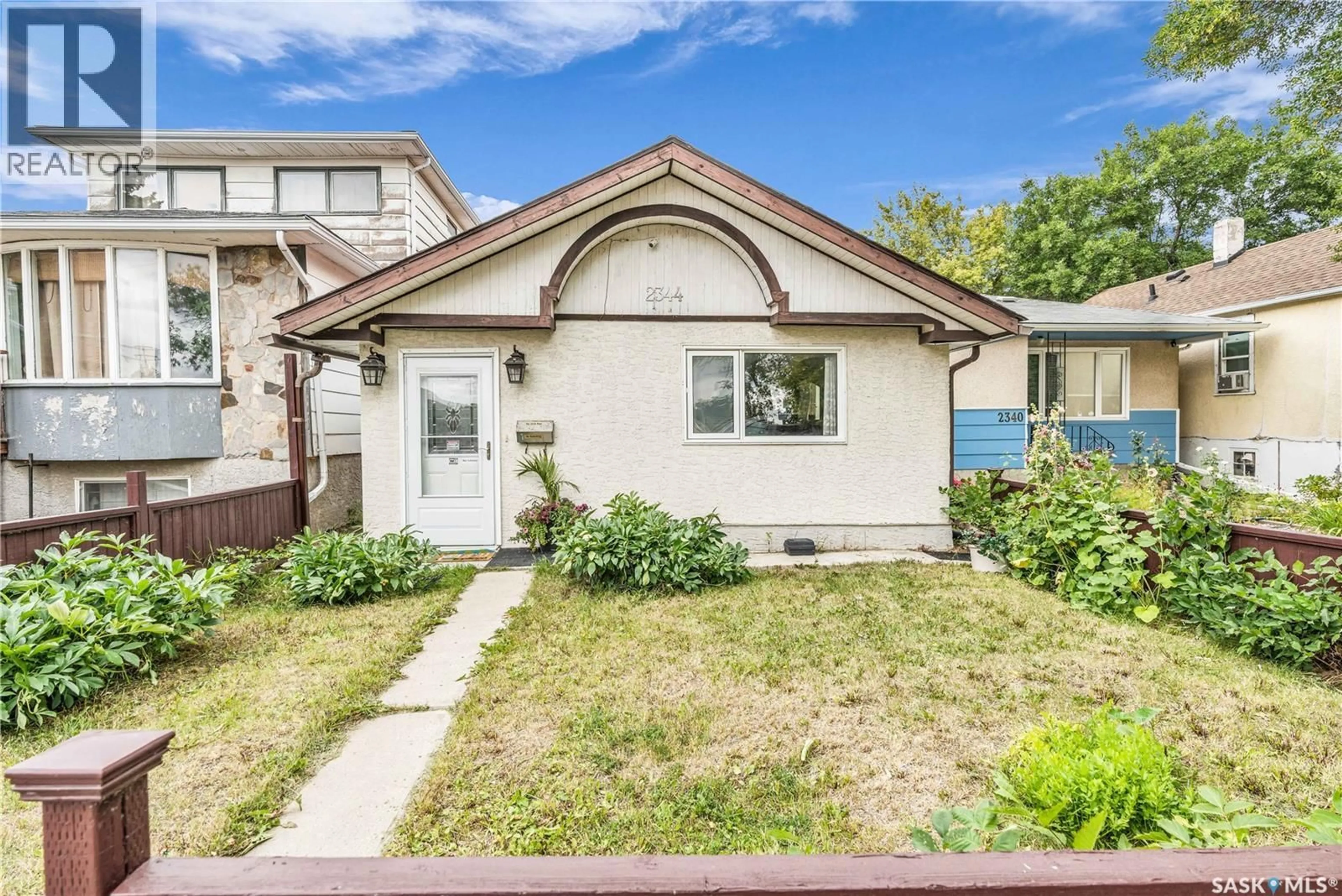 Home with vinyl exterior material, street for 2344 EDGAR STREET, Regina Saskatchewan S4N3L1