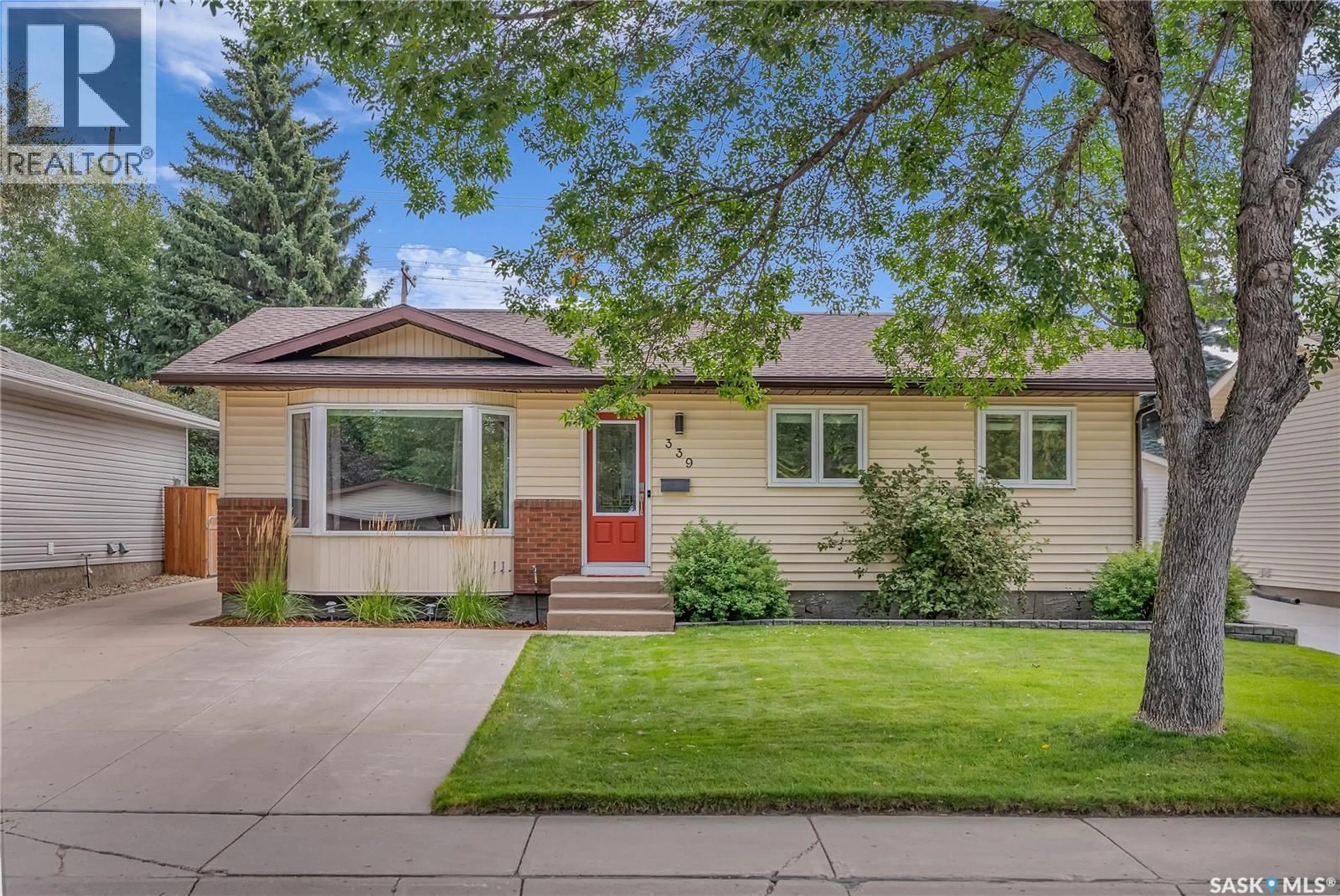 Home with vinyl exterior material, street for 339 KENDERDINE ROAD, Saskatoon Saskatchewan S7N3S9