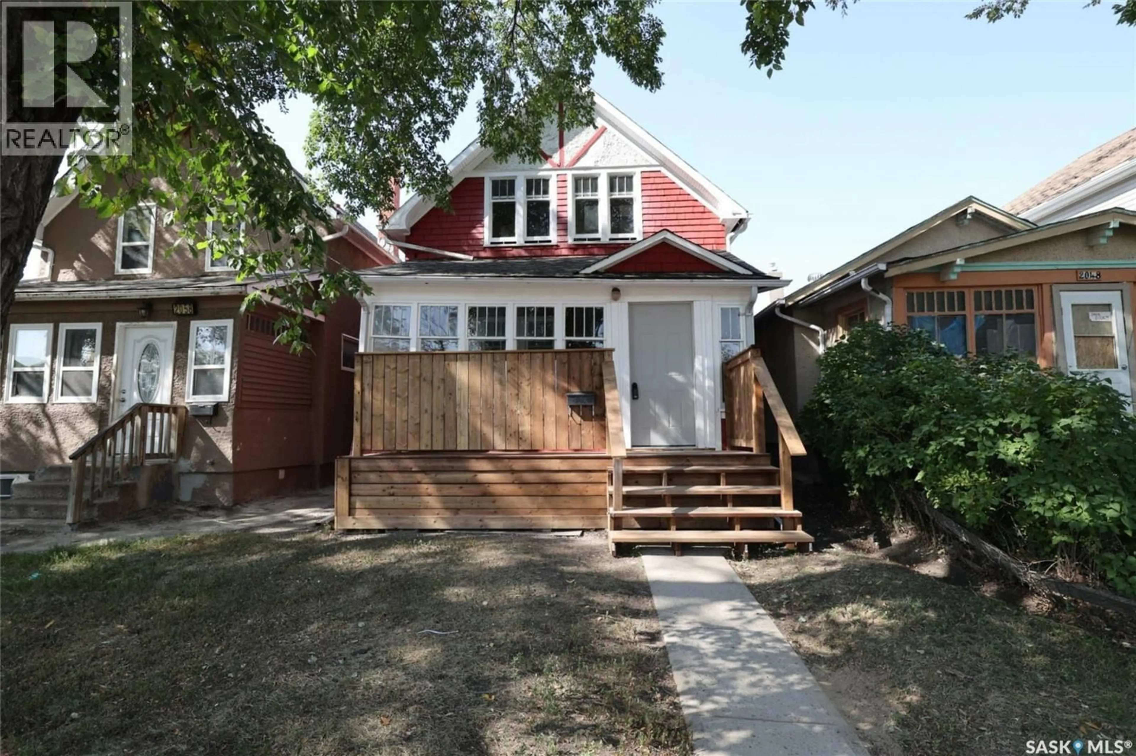 Home with brick exterior material, street for 2050 TORONTO STREET, Regina Saskatchewan S4P1N1