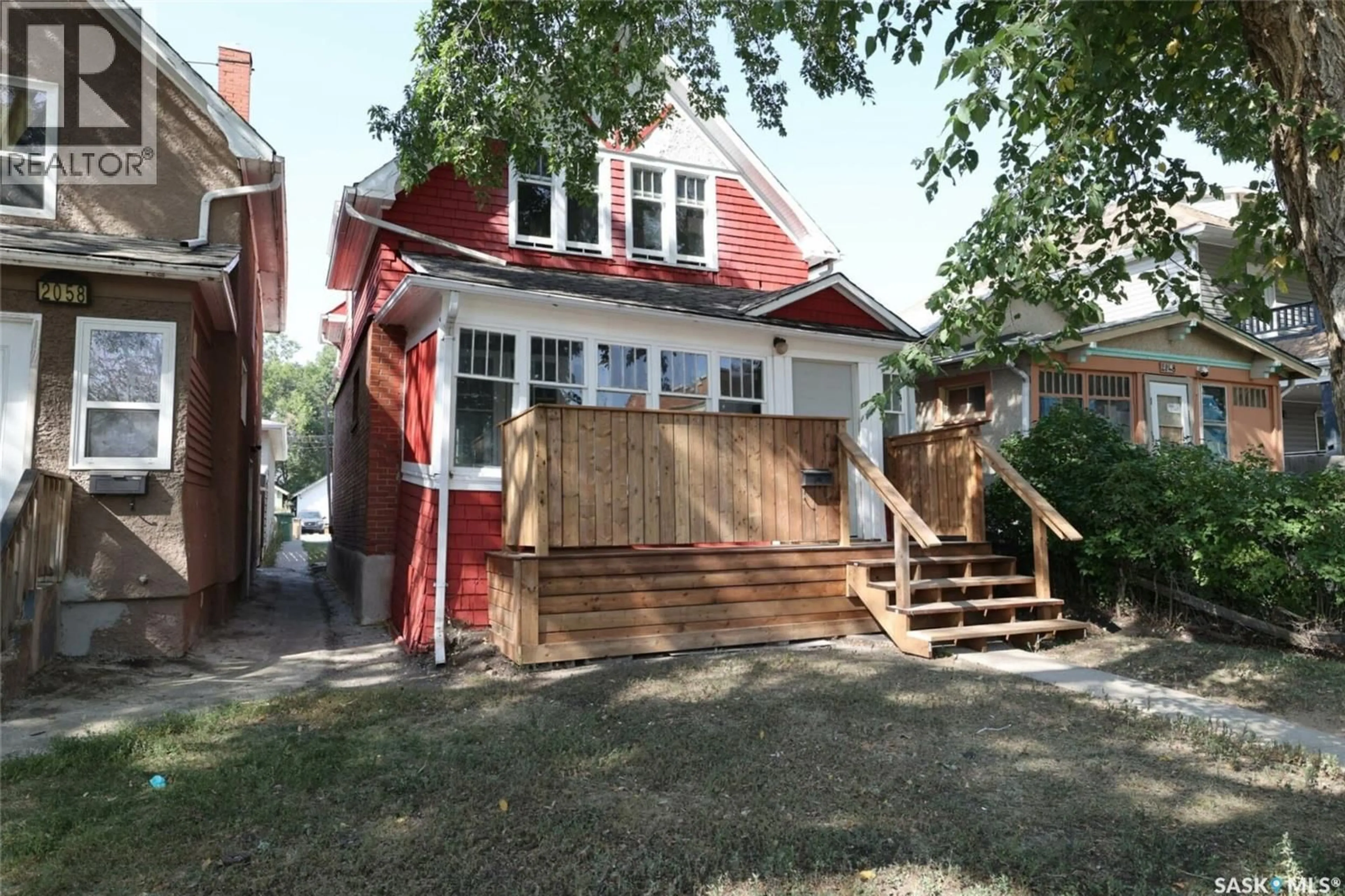 Home with brick exterior material, street for 2050 TORONTO STREET, Regina Saskatchewan S4P1N1