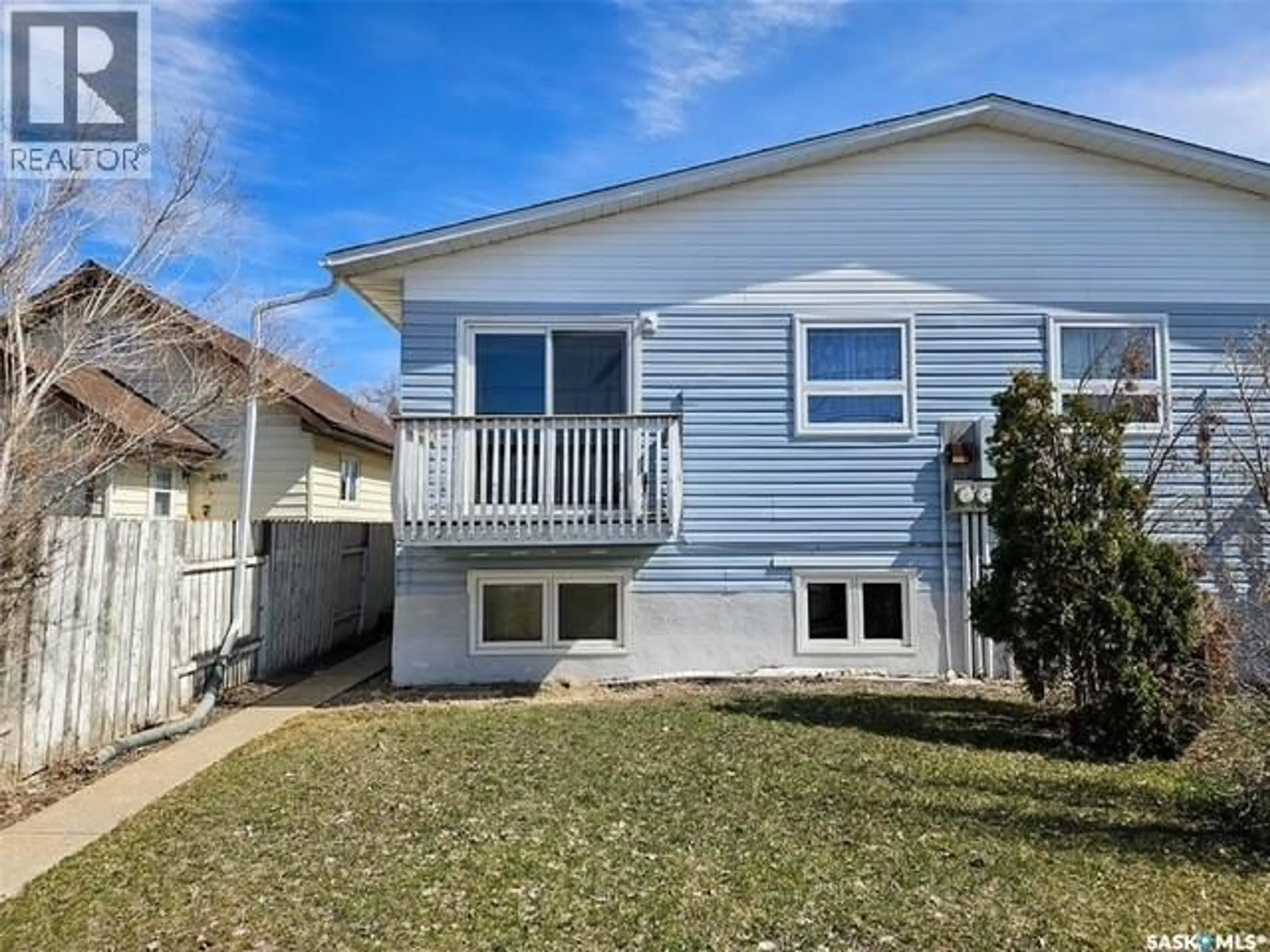 Home with vinyl exterior material, street for S - 2 34 CENTRAL AVENUE, Swift Current Saskatchewan S9H3E6