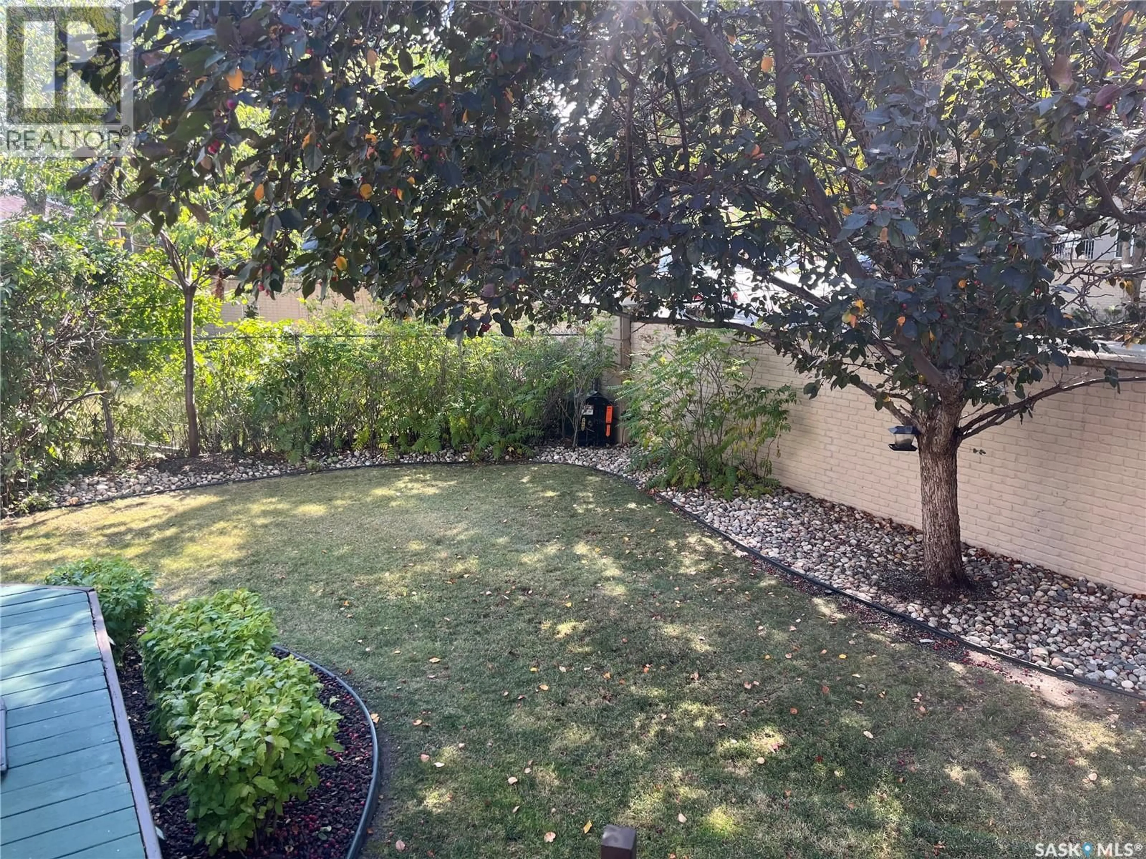 A pic from outside/outdoor area/front of a property/back of a property/a pic from drone, forest/trees view for BAY - 3276 PEYSON BAY E, Regina Saskatchewan S4V2W8