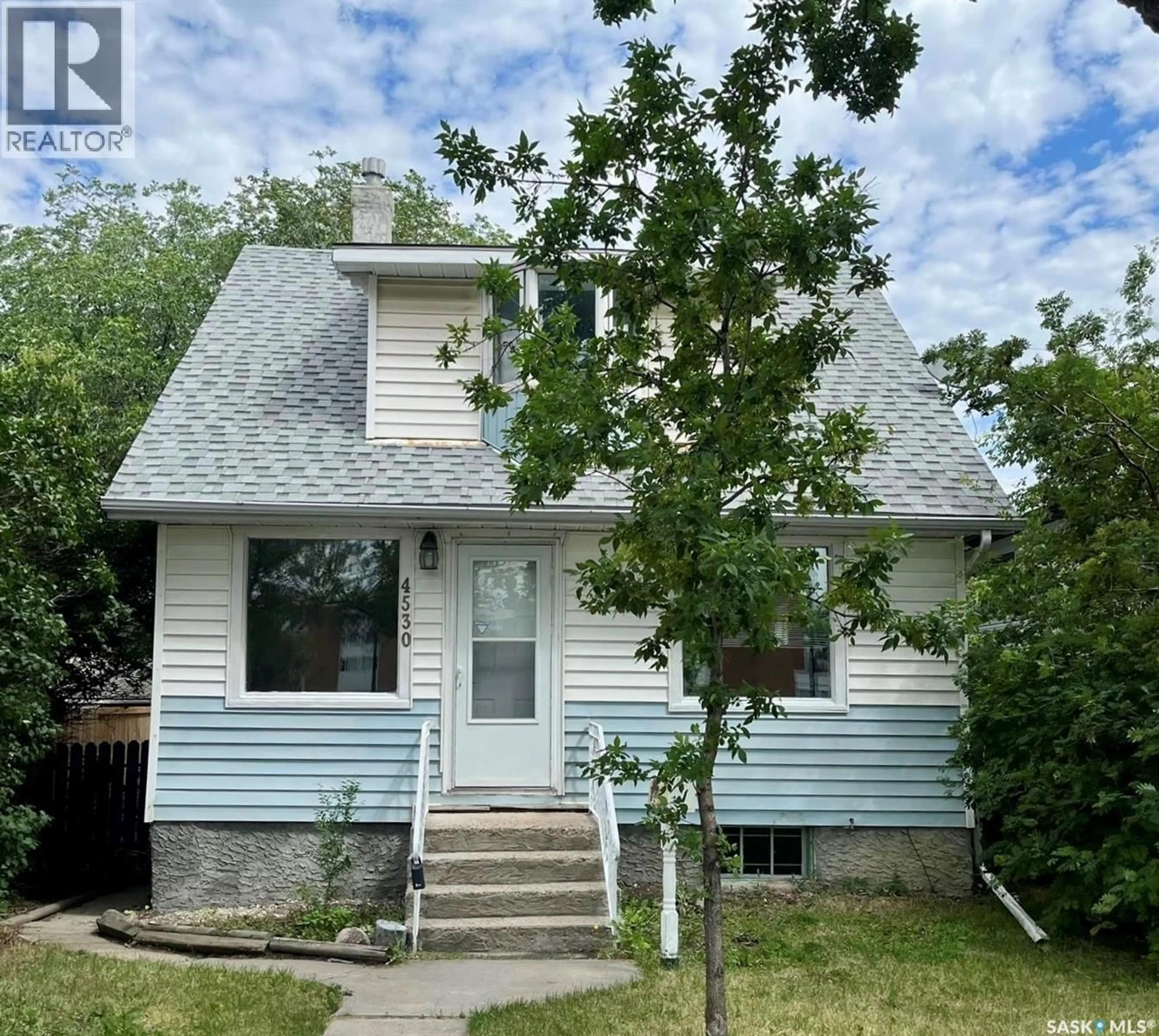 Home with vinyl exterior material, street for 4530 DEWDNEY AVENUE, Regina Saskatchewan S4T1B2