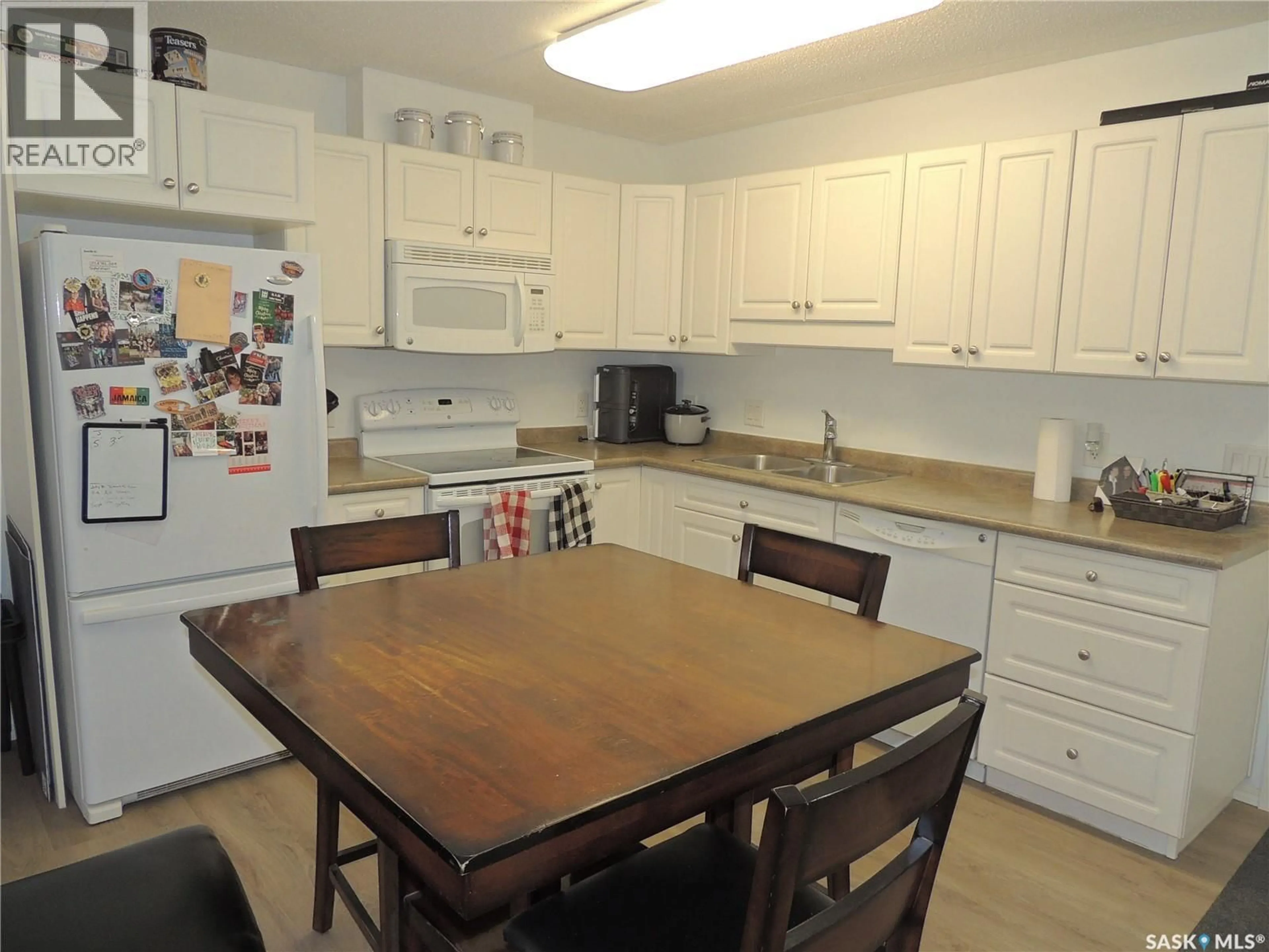 Standard kitchen, wood/laminate floor for 701 - 201 HENRY STREET, Estevan Saskatchewan S4A2B7