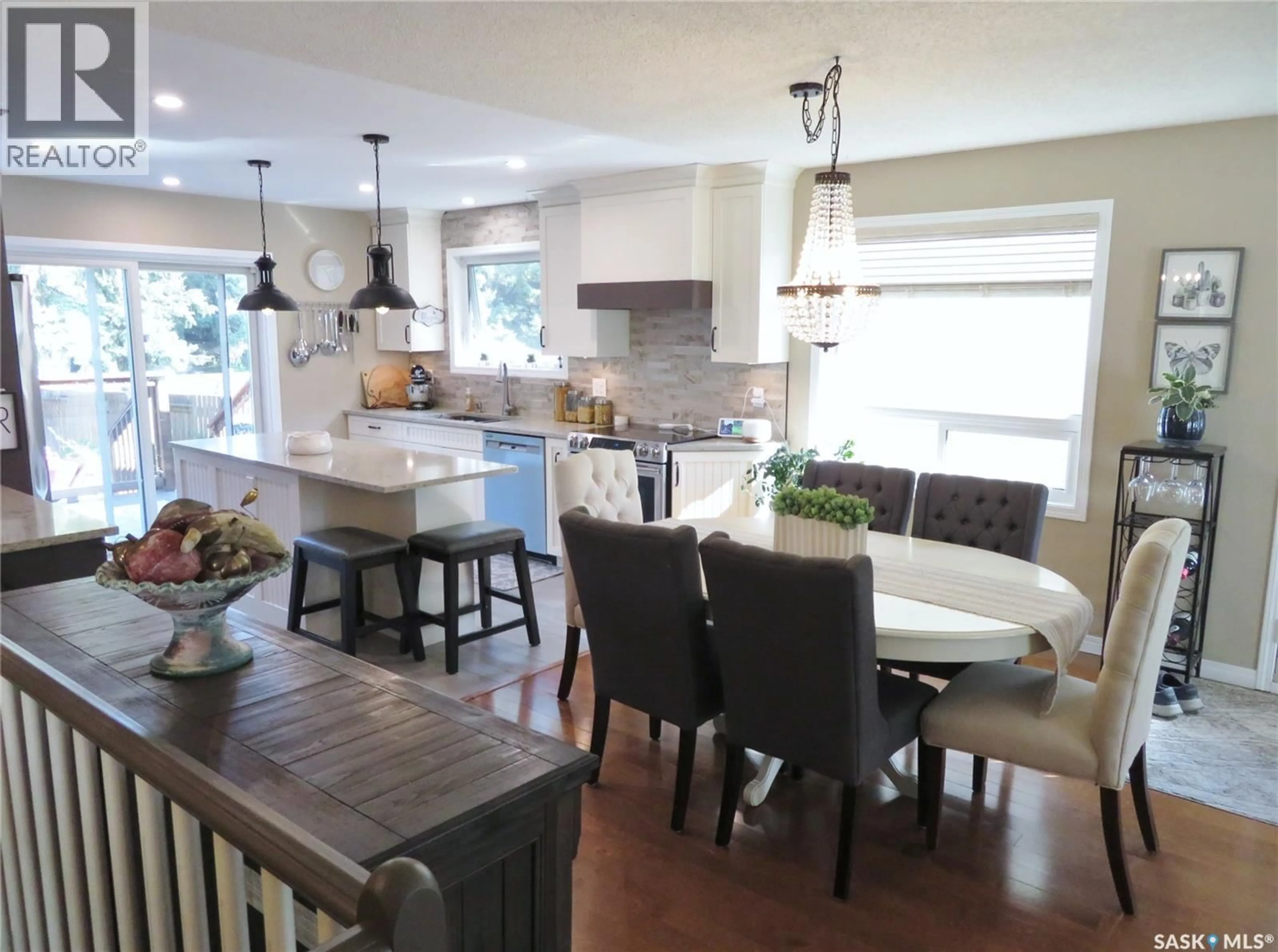 Open concept kitchen, wood/laminate floor for 115 SAGUENAY DRIVE, Saskatoon Saskatchewan S7K4M8