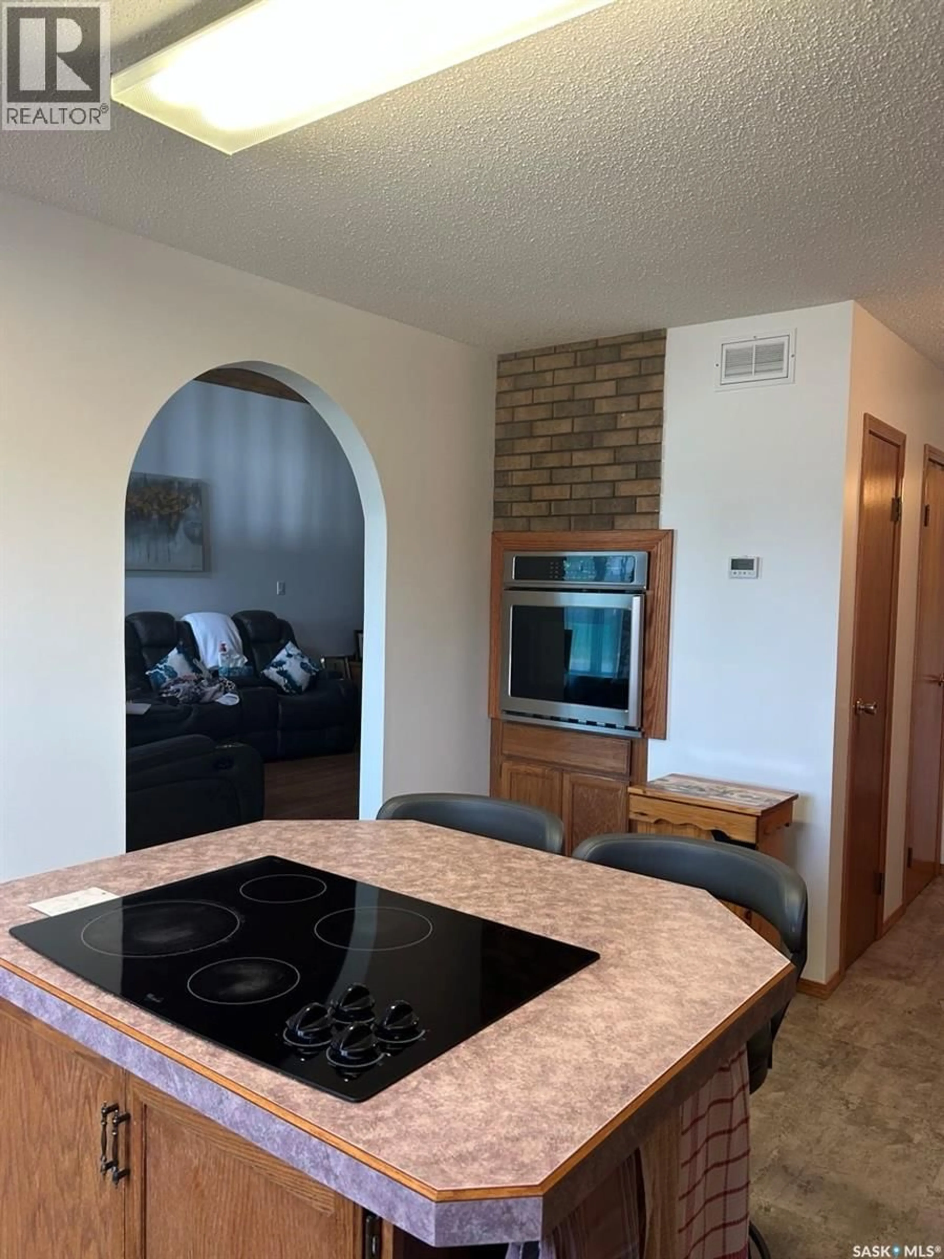 Living room with furniture, ceramic/tile floor for 206 2ND STREET, Carrot River Saskatchewan S0E0L0
