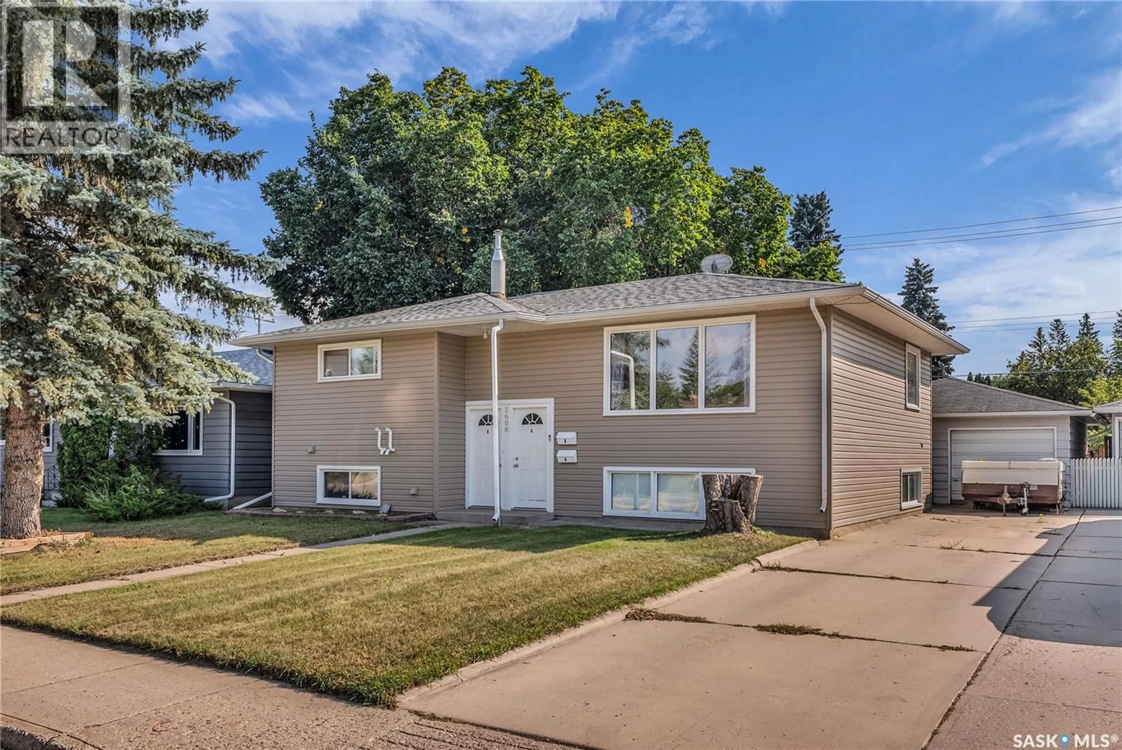 Home with vinyl exterior material, street for 1608 RUTH STREET, Saskatoon Saskatchewan S7J0L8