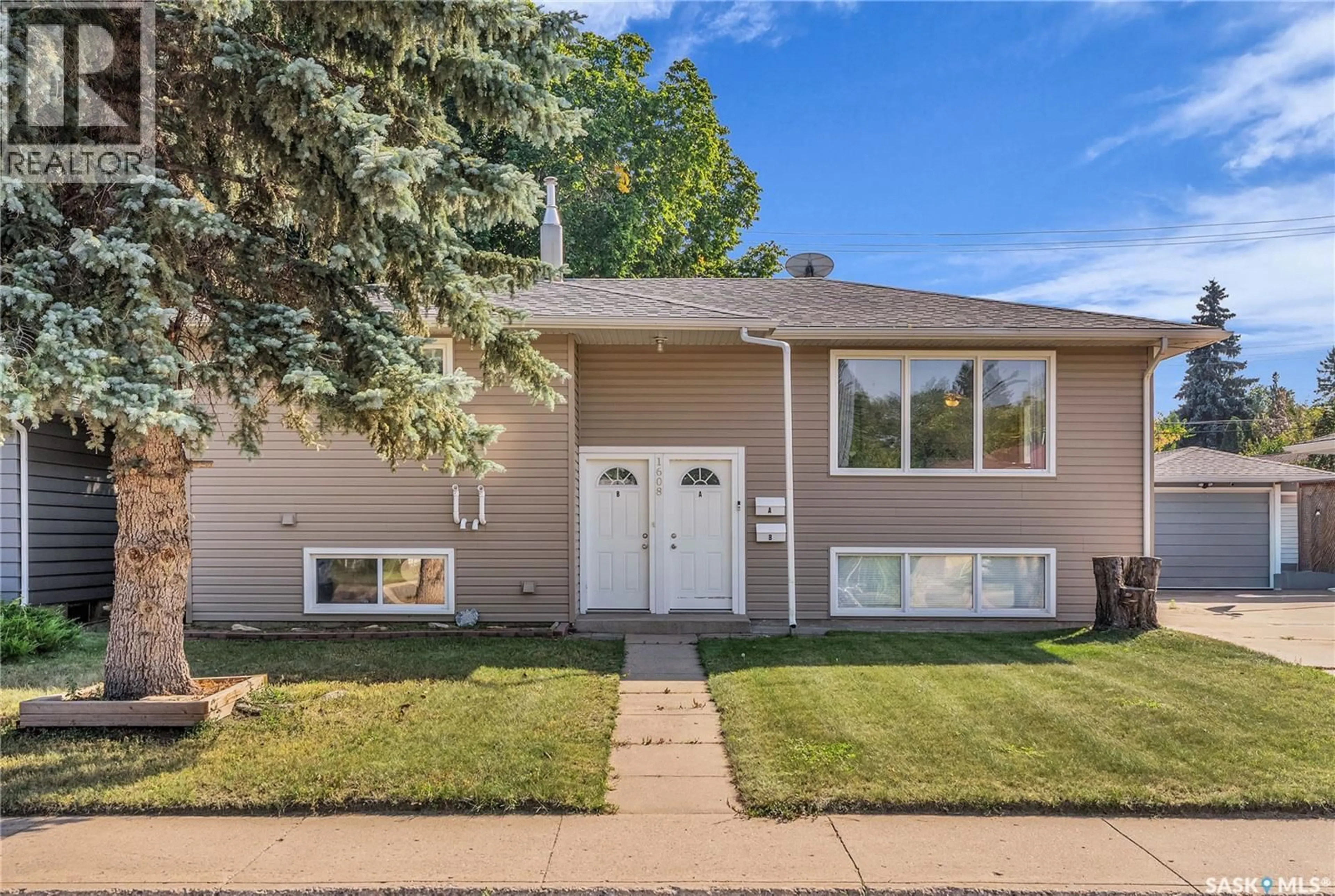Home with vinyl exterior material, street for 1608 RUTH STREET, Saskatoon Saskatchewan S7J0L8