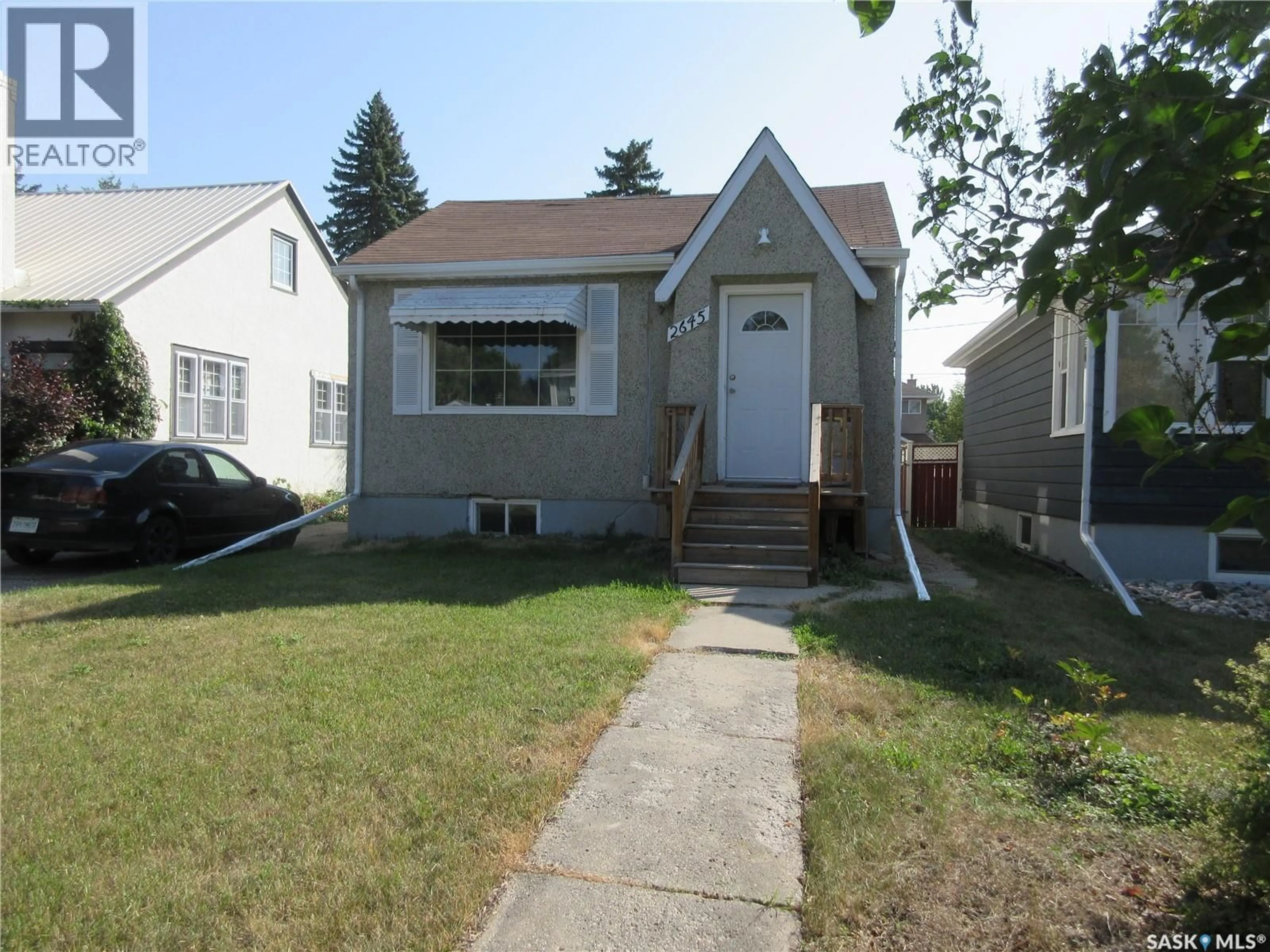 Home with vinyl exterior material, street for 2645 BRODER STREET, Regina Saskatchewan S4N3T6