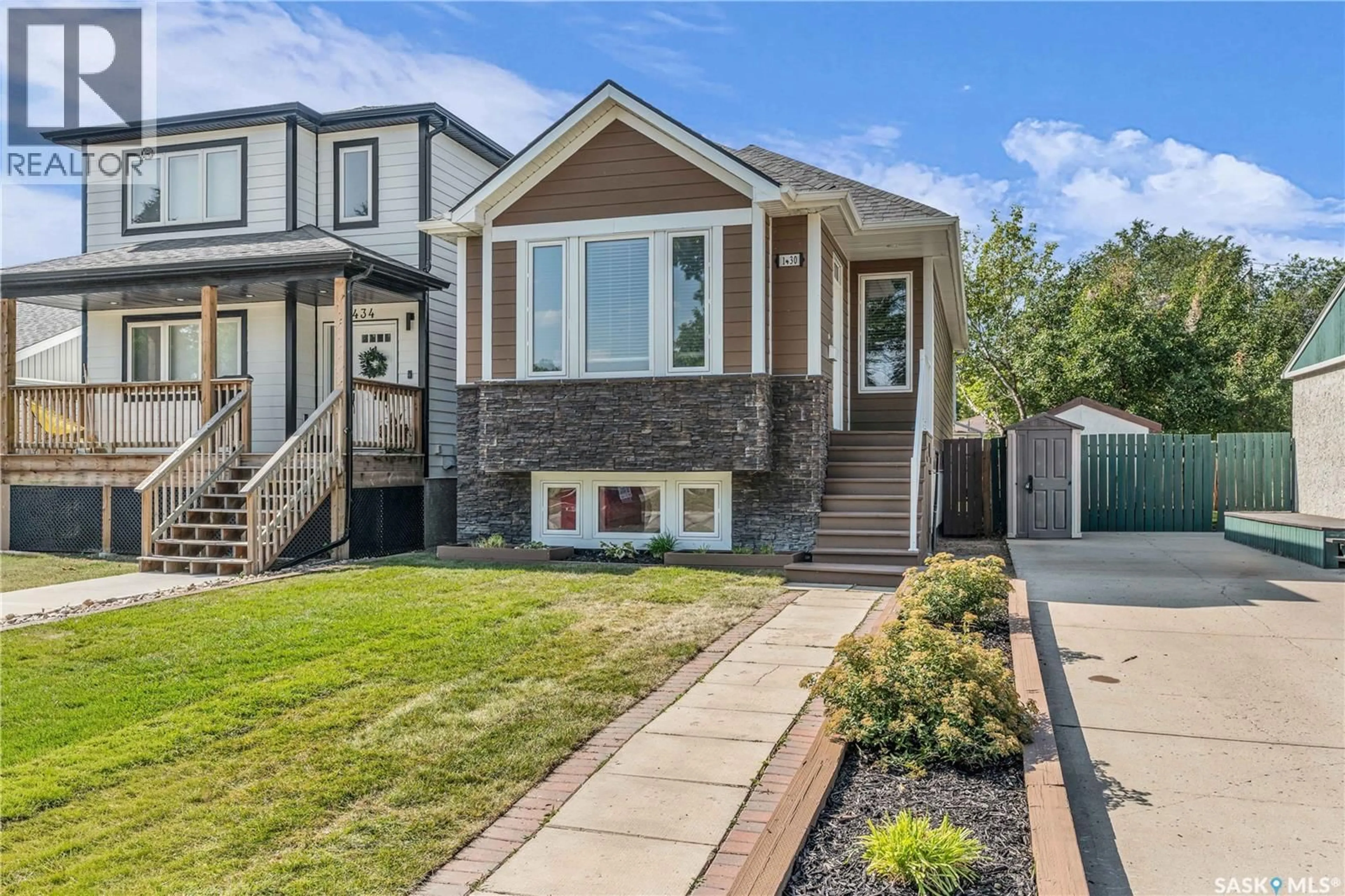 Home with vinyl exterior material, street for 1430 ELLICE STREET, Regina Saskatchewan S4T5S3