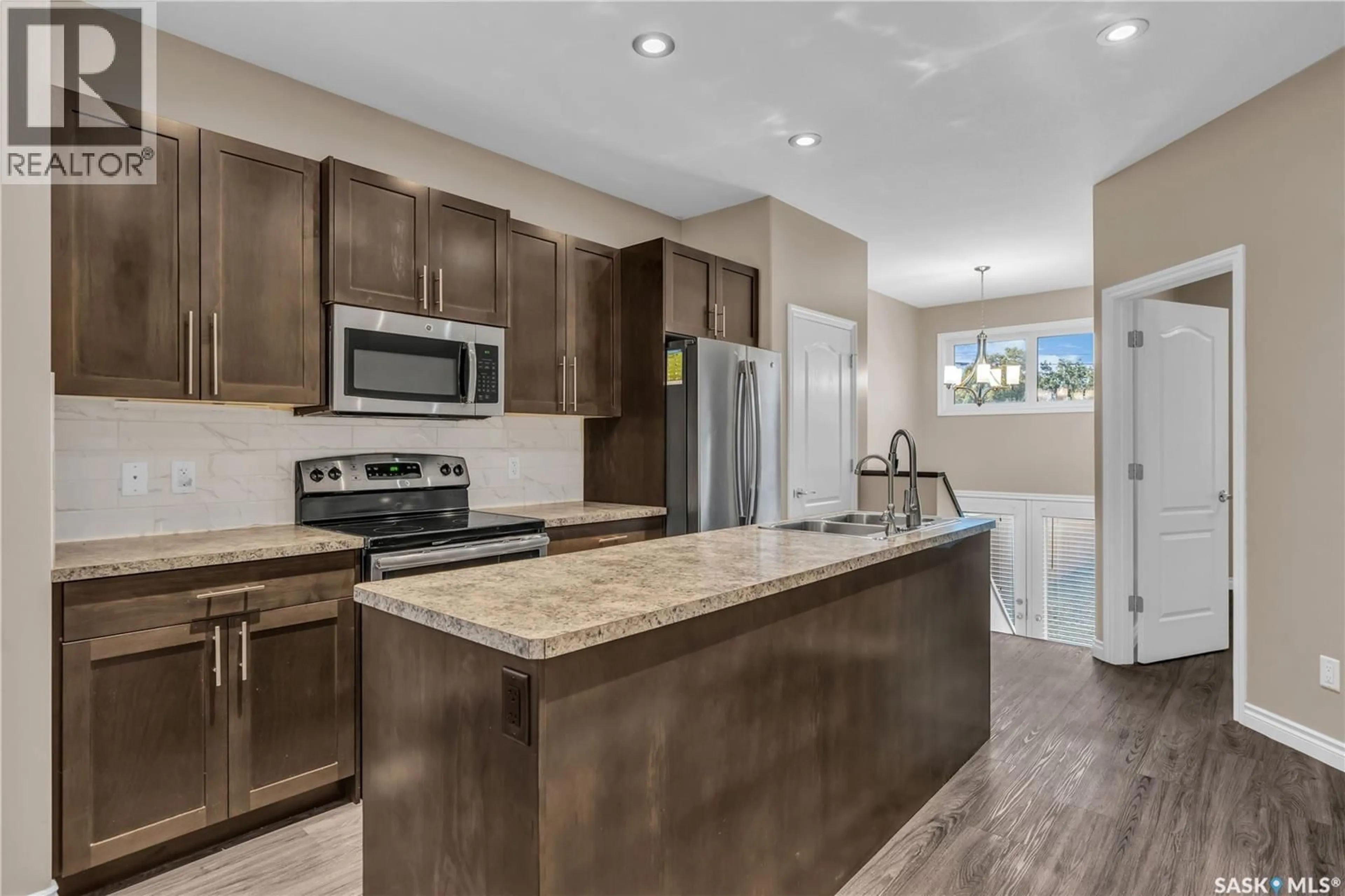 Open concept kitchen, ceramic/tile floor for 1430 ELLICE STREET, Regina Saskatchewan S4T5S3