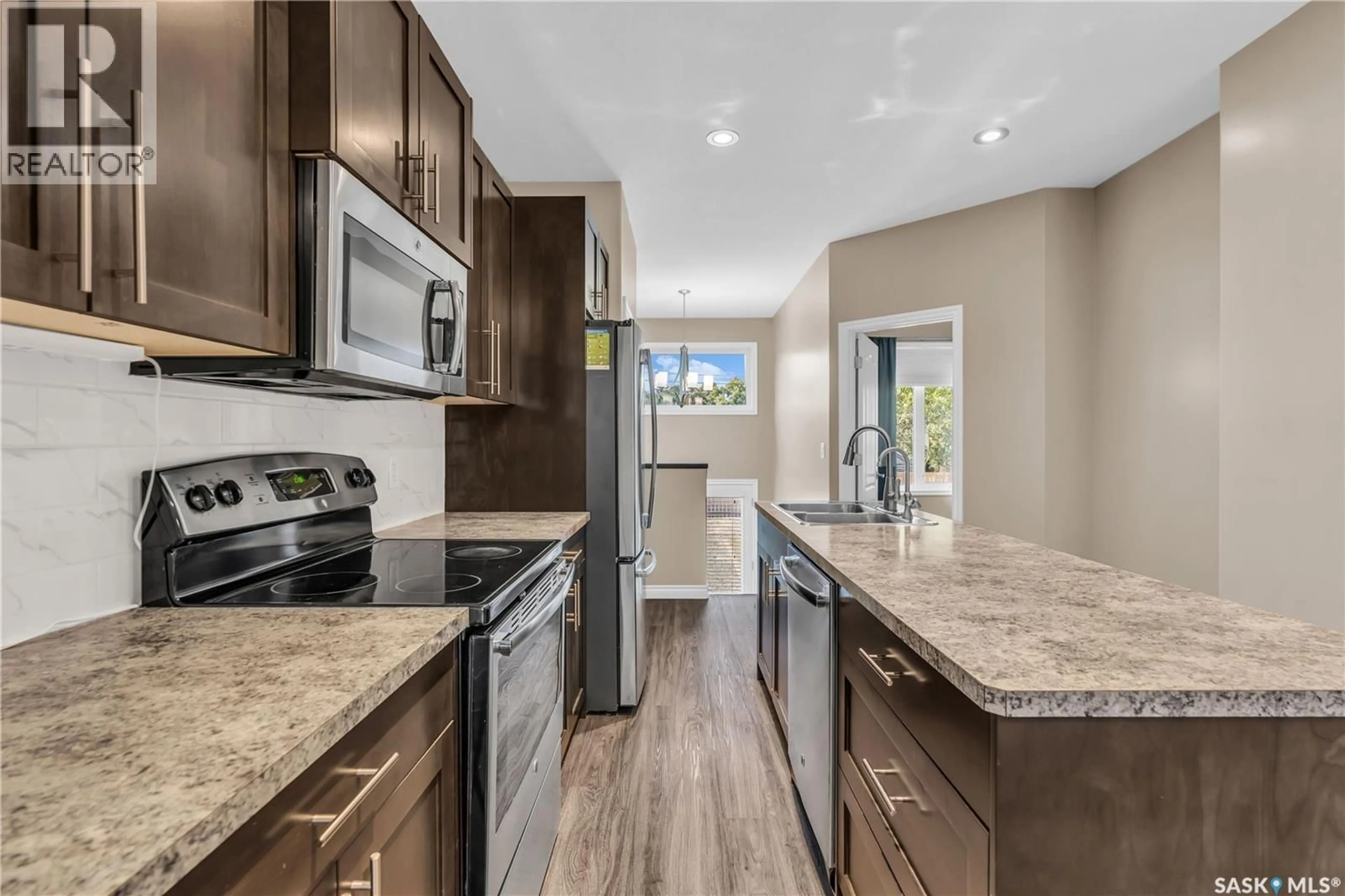 Open concept kitchen, ceramic/tile floor for 1430 ELLICE STREET, Regina Saskatchewan S4T5S3