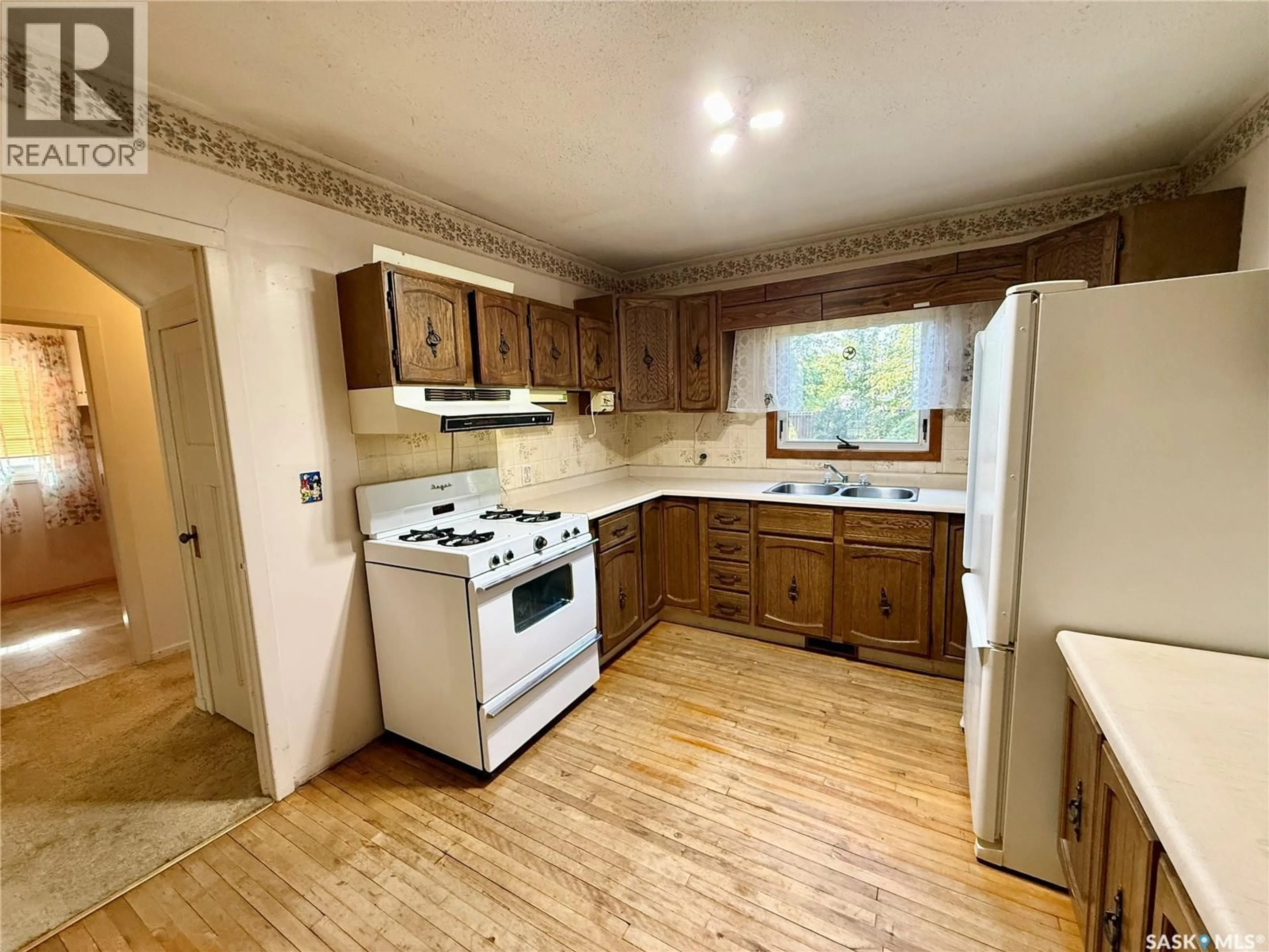 Standard kitchen, wood/laminate floor for 1361 107TH STREET, North Battleford Saskatchewan S9A1Z6